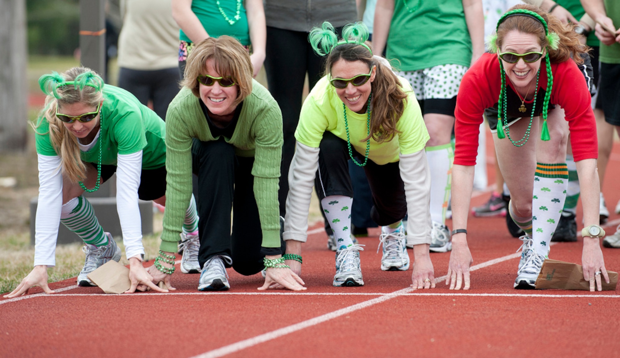 Runners prepare for the kick-off of the St. Patty's Day Pot O' Gold 5K run March 16 here. The joint base community sported their best Irish looks for the run. (U.S. Air Force photo by Russ Meseroll/Released)