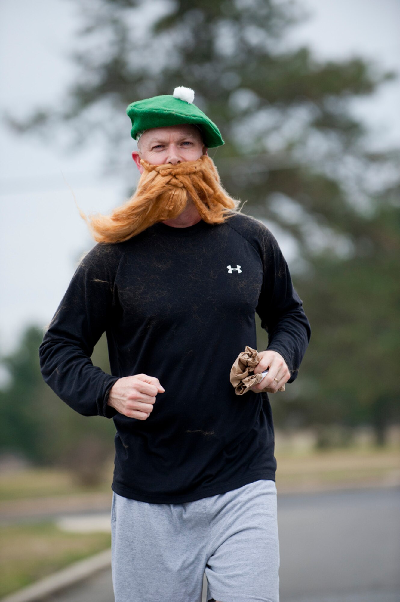 Chief Master Sgt. Bryan Creager, 305th Air Mobility Wing command chief, sports an Irish look as he participates in the St. Patty's Day Pot O' Gold 5K run March 16 here. (U.S. Air Force photo by Russ Meseroll/Released)