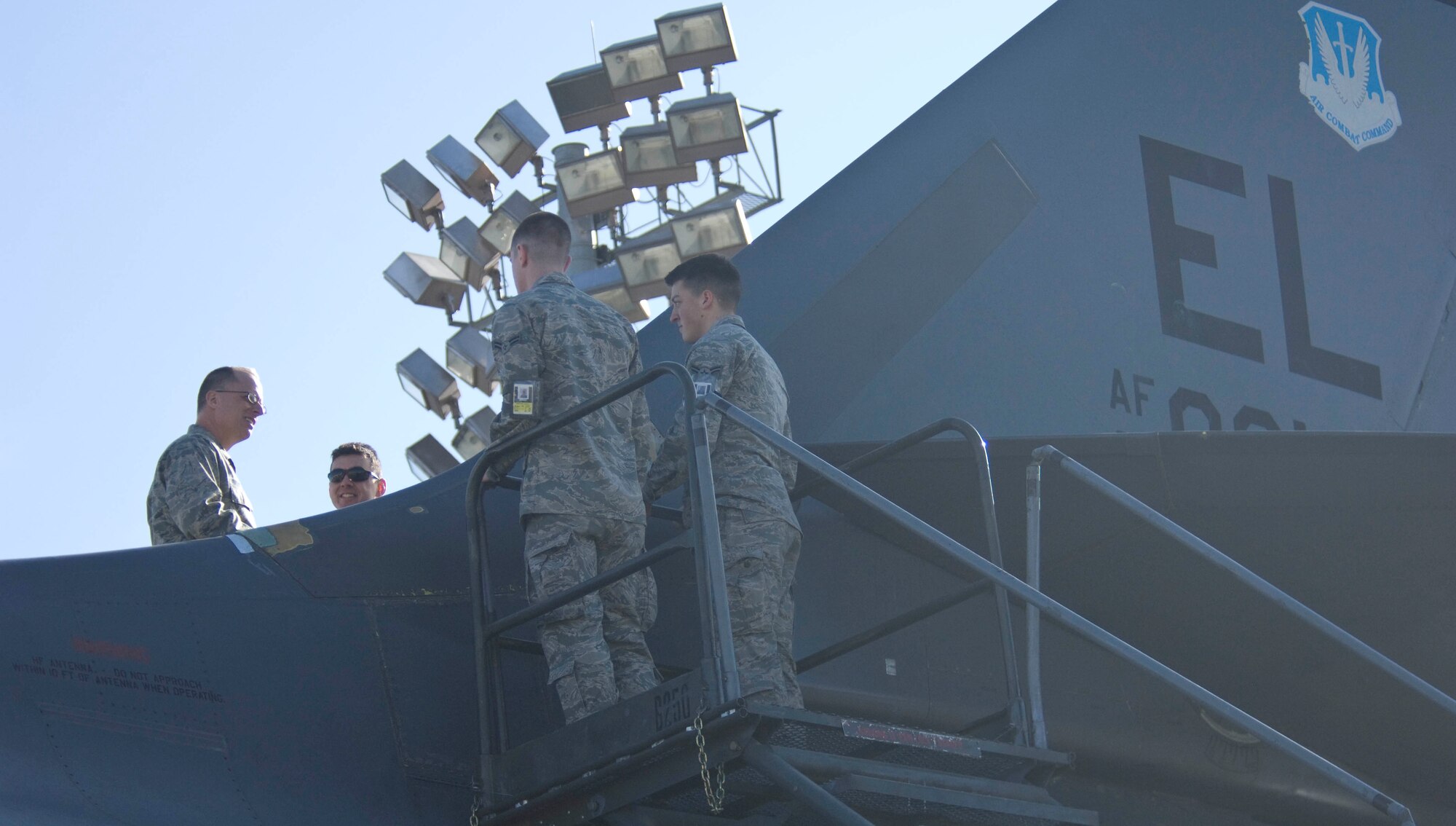 Col. Mark Weatherington, 28th Bomb Wing commander, visits with maintenance professionals inspecting the B-1 bomber during a Phase I Operational Readiness Exercise at Ellsworth Air Force Base, S.D., March 14, 2012. OREs test the ability of Airmen to prepare and respond to real world taskings.  (U.S. Air Force photo by Airman 1st Class Anania Tekurio/Released)