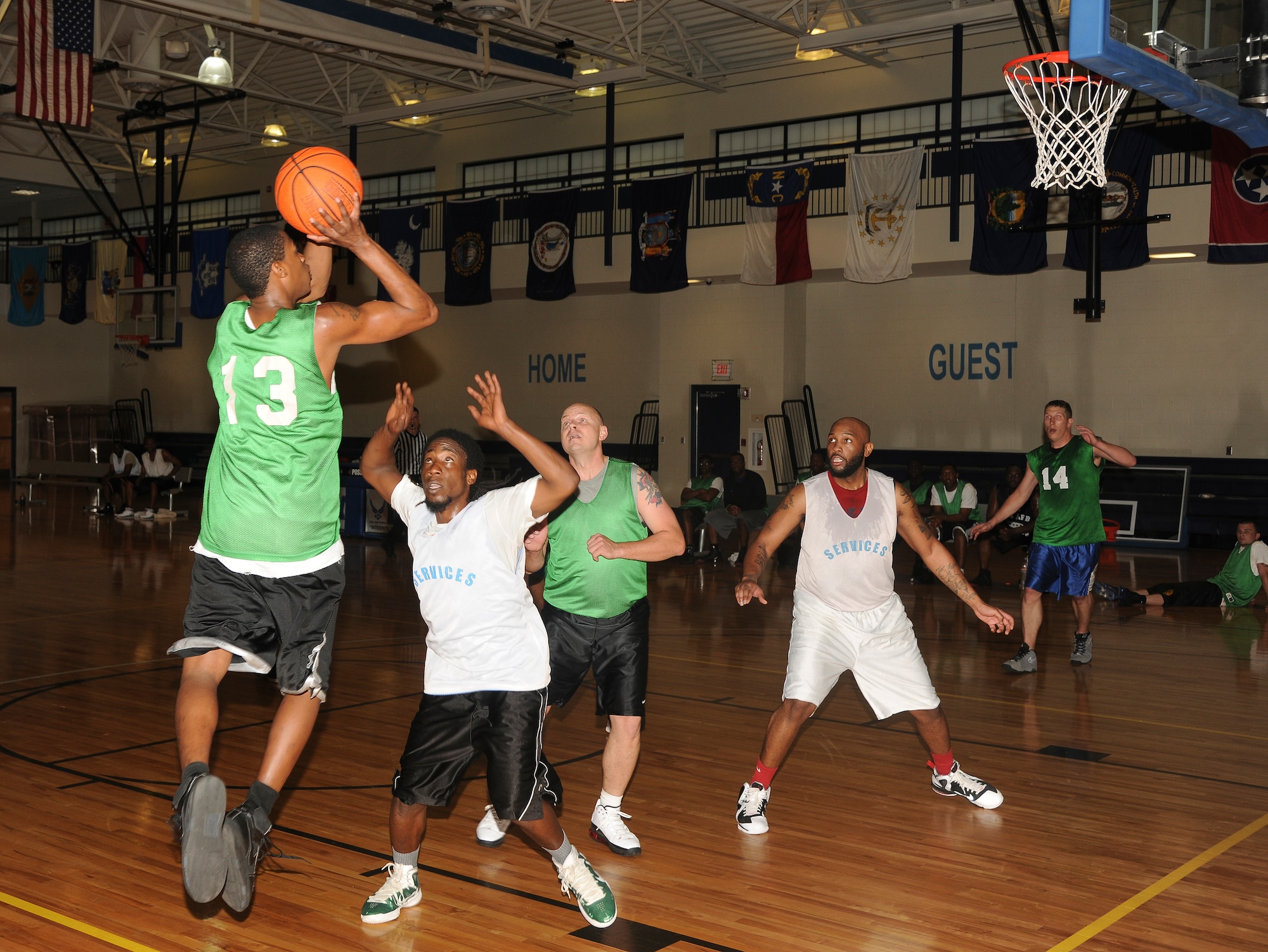 Larry Jackson, 23d Maintenance Operations Squadron, takes a shot during the intramural basketball championship game at Moody Air Force Base, Ga., March 21, 2012. The basket drew 23d MOS within five points with 1:27 left in the second half and brining within inches of a comeback. (U.S. Air Force photo by Airman 1st Class Paul Francis/Released)
