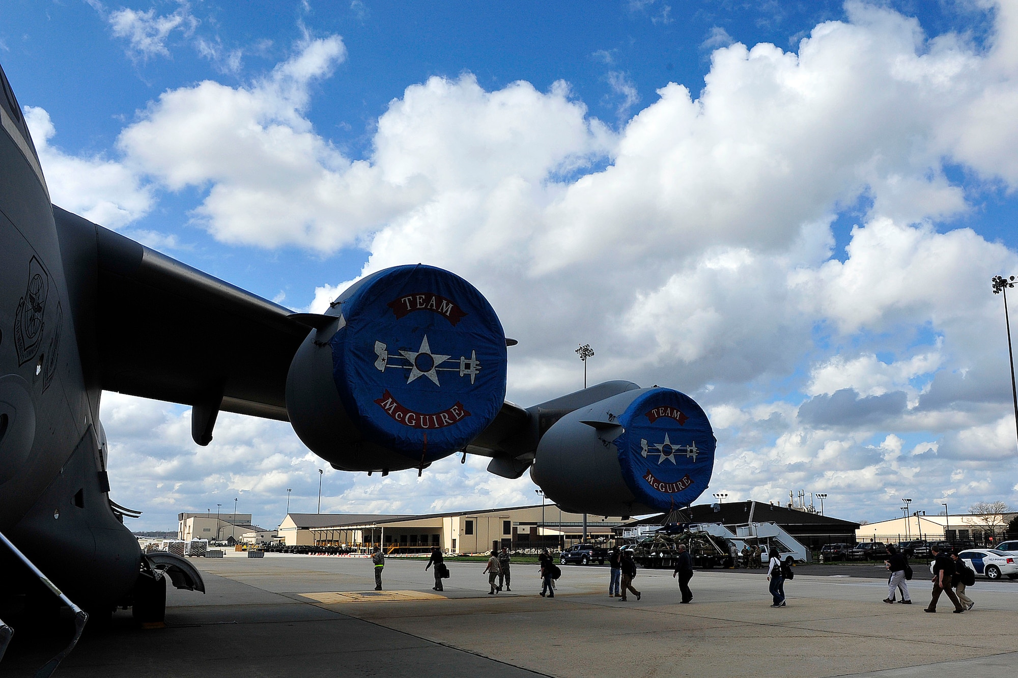 Members of the Federal Emergency Management Agency board a 305th Air Mobility Wing C-17 Globemaster III during a mobility exercise March 20 here. Approximately 30 incident management assistance team members from FEMA Region II, based in New York, N.Y., and FEMA Region III, from Philadelphia, Pa., simulated a hurricane response deployment to Puerto Rico with the help of the 621st CRW and the 305th Air Mobility Wing. (U.S. Air Force photo by Tech. Sgt. Parker Gyokeres/Released)
