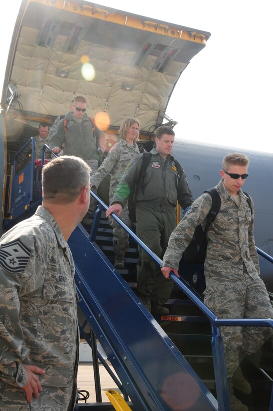 Members of the 148th Fighter Wing return from Nellis Air Force Base, Nevada, Mar. 17, 2012. The 148th participated in Red Flag, a final exercise at the tail end of the 148th’s conversion to the Block 50 F-16 from Feb. 27 to Mar. 16. (National Guard photo by Tech. Sgt. Brett Ewald.)