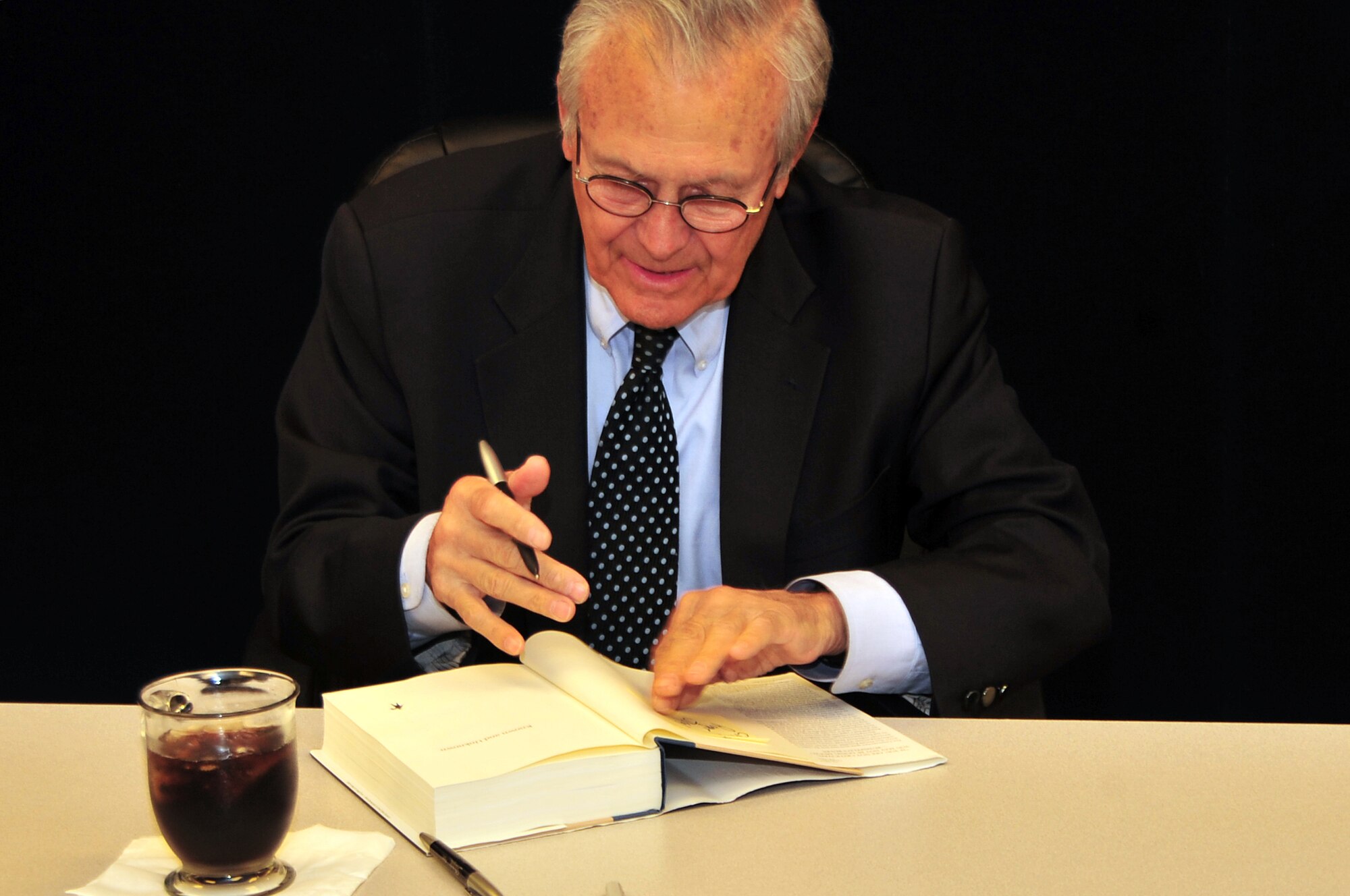OFFUTT AIR FORCE BASE, Neb - Former Secretary of Defense Donald Rumsfeld was at the Offutt Air Force Base Exchange signing copies of his book titled "Known and Unknown: A Memoir" March 18.  Rumsfeld is giving all of his profits from the book's sale to veterans' charities. (Air Force photo by D.P. Heard/Released)