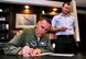 WHITEMAN AIR FORCE BASE, Mo. -- Brig. Gen. Scott Vander Hamm, 509th Bomb Wing commander, signs his contribution to the Air Force Assistance Fund March 12. Whiteman AFB is scheduled to kick off the annual AFAF campaign, ‘Commitment to Caring, Taking Care of our Own,’ March 26. Whiteman Airmen will be able to participate through May 4. (U.S. Air Force photo/Senior Airman Nick Wilson)