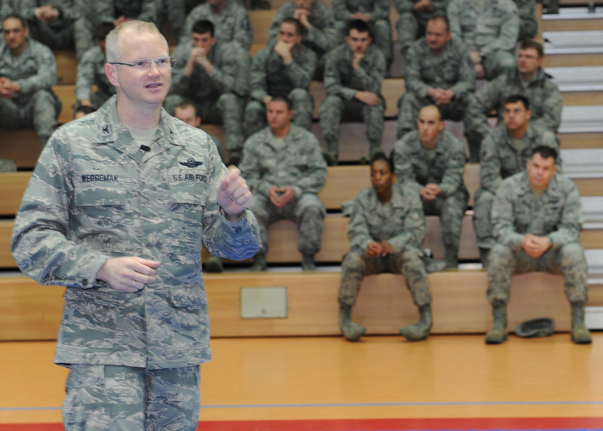 SPANGDAHLEM AIR BASE, Germany – Col. Chris Weggeman, 52nd Fighter Wing commander, briefs Airmen during a commander’s call at the Skelton Memorial Fitness Center here March 21. Weggeman spoke about current and upcoming changes to the Air Force, which are designed to modernize its air, space and cyber inventories. (U.S. Air Force photo by Senior Airman Christopher Toon/Released)