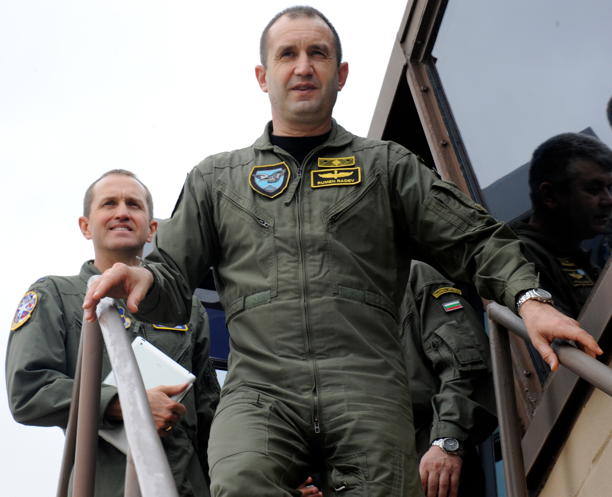 LAUGHLIN AIR FORCE BASE, Texas – Brig. Gen. Rumen Radev, Deputy Commander of the Bulgarian Air Force, and Col. Andrew Brabson, 47th Operations Group commander, step down from one of Laughlin’s runway supervisory units after touring the flight line here March 19. Radev visited Laughlin as part of a series of base visits designed to highlight the U.S. Air Force’s pilot training program and aid in Bulgarian Air Force pilot training reform. (U.S. Air Force photo/Airman 1st Class Nathan L. Maysonet)