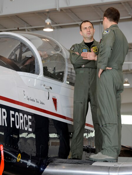 LAUGHLIN AIR FORCE BASE, Texas – Brig. Gen. Rumen Radev, Deputy Commander of the Bulgarian Air Force, gets a briefing on the T-6 Texan II aircraft at the T-6 Weather Hanger here March 19. Radev visited Laughlin as part of a series of base visits designed to highlight the U.S. Air Force’s pilot training program and aid in Bulgarian Air Force pilot training reform. (U.S. Air Force photo/Airman 1st Class Nathan L. Maysonet)