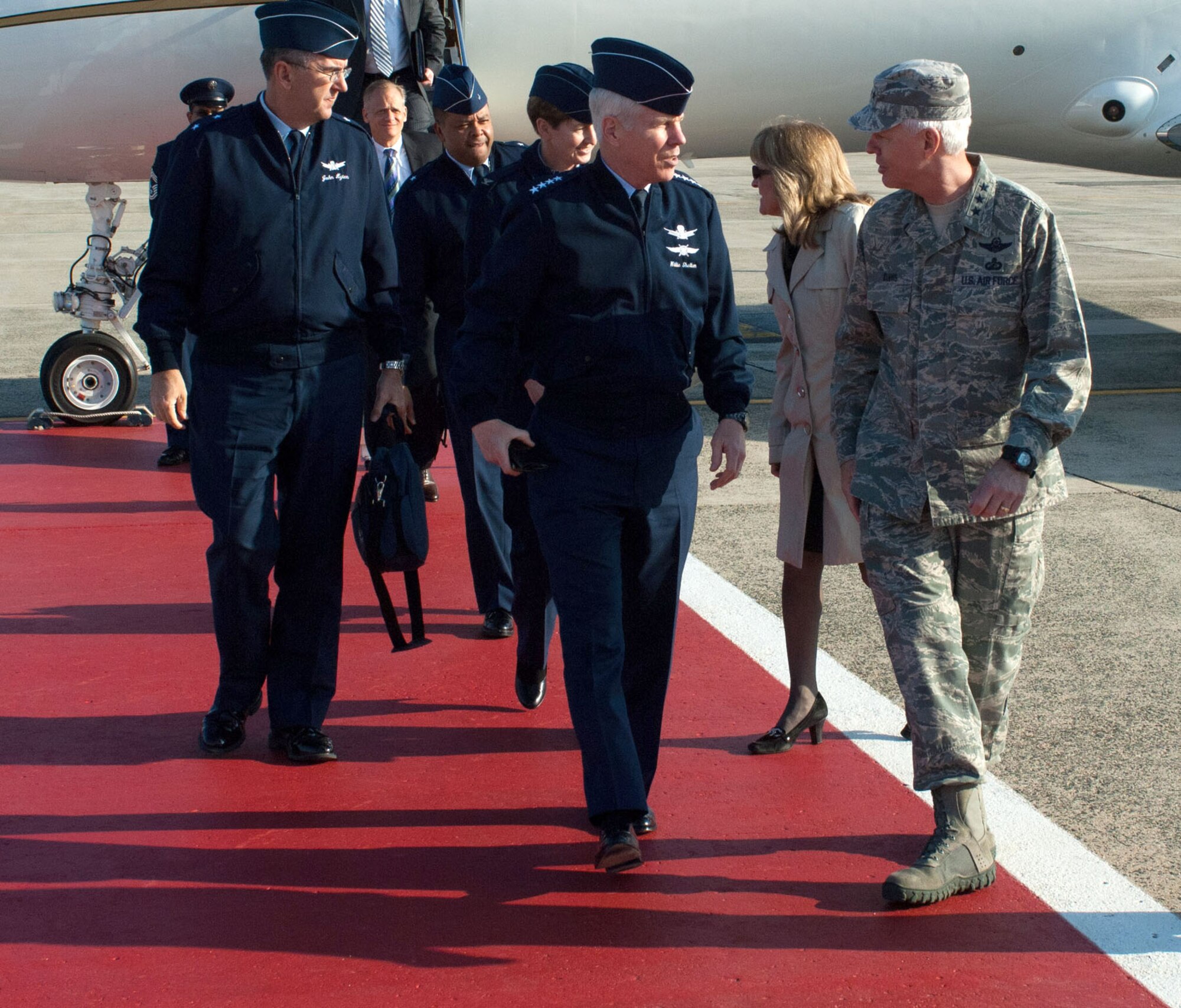 HANSCOM AIR FORCE BASE, Mass. – Lt. Gen. CR Davis (right), Electronic Systems Center commander, greets Gen. William Shelton (center), Air Force Space Command commander, upon his arrival here March 20. During his visit to the area, Shelton participated in tours and demonstrations about Space Command programs. (U.S. Air Force photo by Rick Berry)