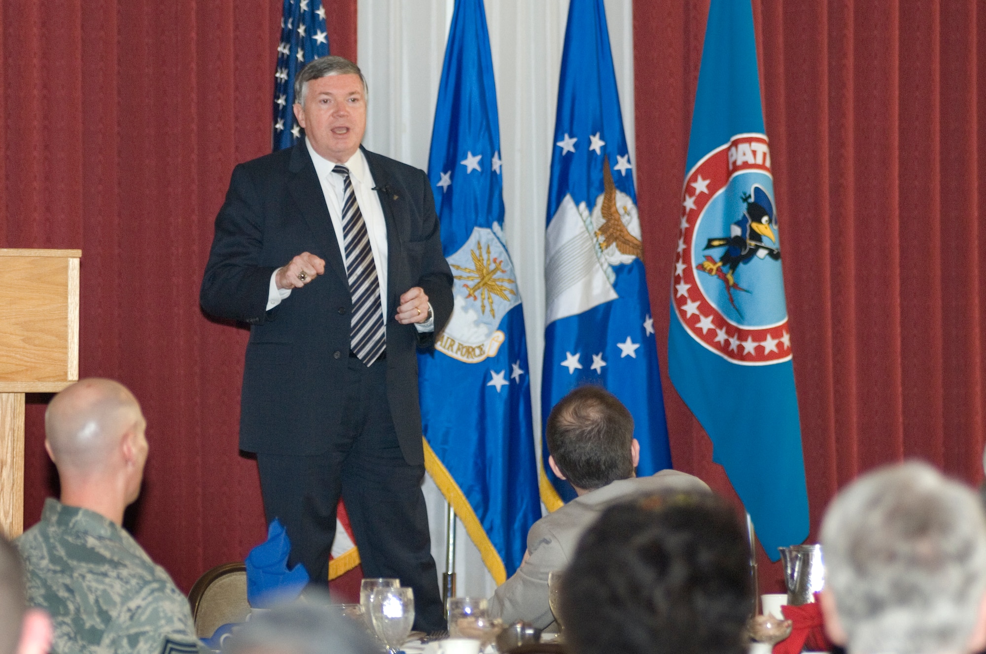 HANSCOM AIR FORCE BASE, Mass. -- James (Snake) Clark, the Air Force director of Intelligence, Surveillance and Reconnaissance Innovations, addresses attendees at a March 21 luncheon here. Clark said lean budget times present opportunities for innovative thinking and encouraged work on rapid solutions to warfighting needs. (U.S. Air Force Photo by Rick Berry)