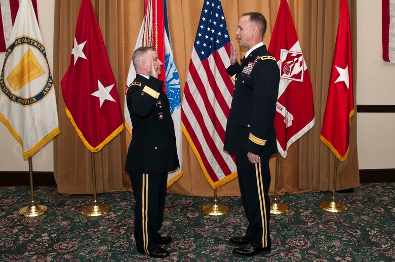 SAN FRANCISCO — Maj. Gen. Merdith "Bo" Temple, acting Chief of Engineers for the U.S. Army Corps of Engineers, administers the officer's oath to newly promoted Brig. Gen. Mike Wehr, USACE South Pacific Division Commander, at a Frocking Ceremony, March 15, 2012.