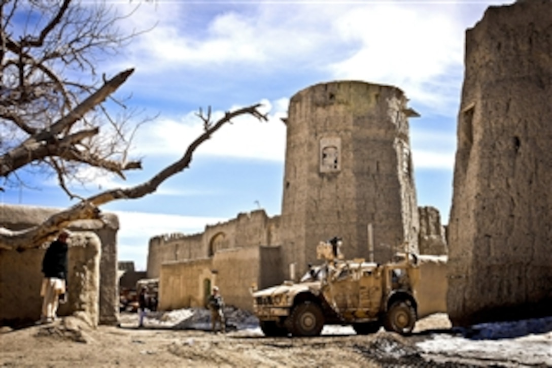 U.S. Army soldiers cordon off the town square of a small village near Combat Outpost Yosef Khel in Afghanistan's Paktika province on March 10, 2012.  The soldiers helped Afghan forces conduct traffic check points near the village.  
