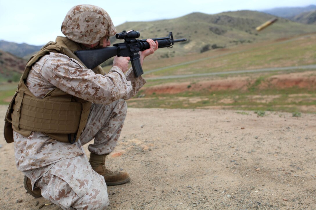 Wives of Weapons Co., 2nd Battalion, 7th Marine Regiment, Marines look over the military operations on urban terrain town during 2/7’s Field Safari March 23, 2012.