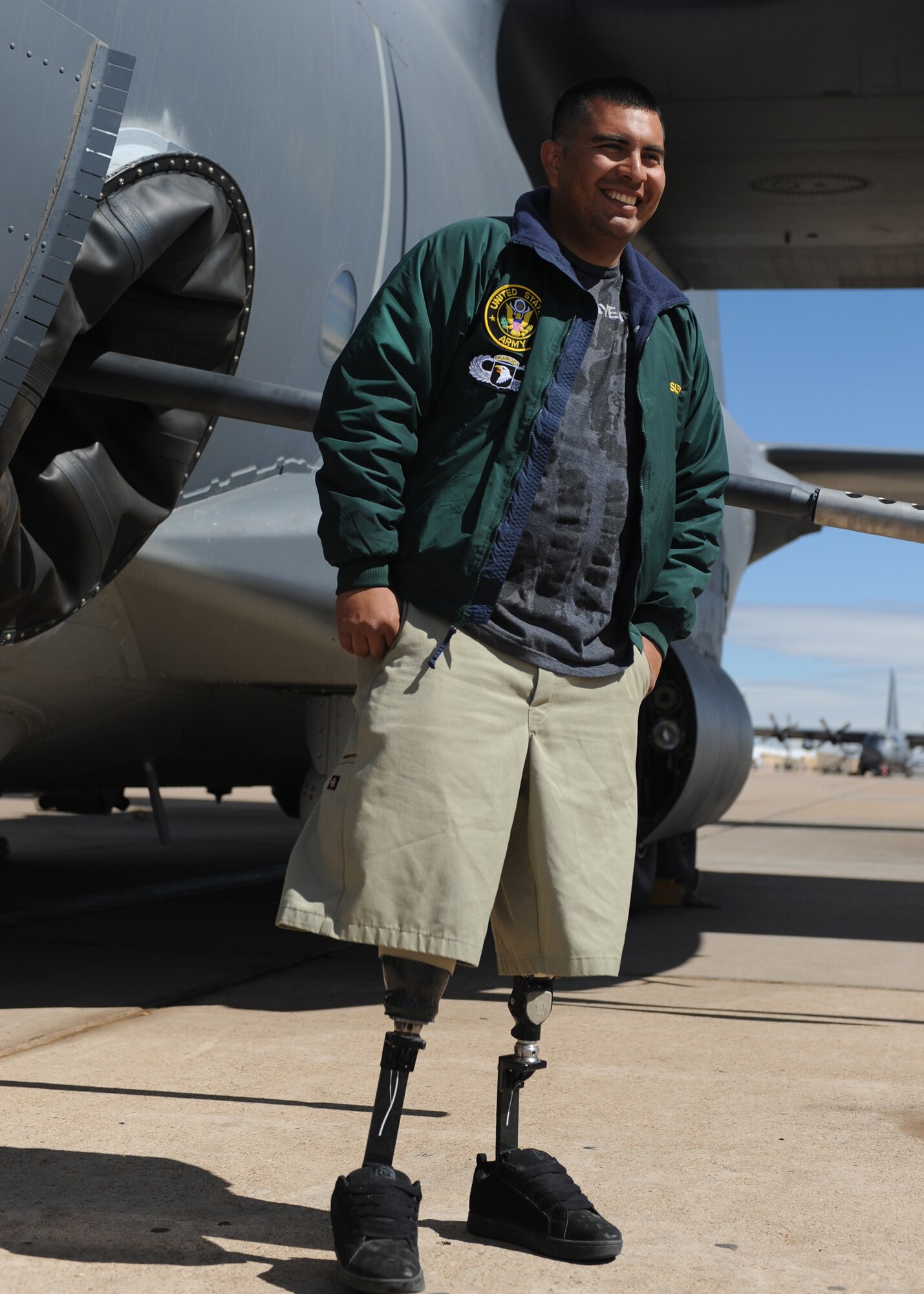 U.S. Army veteran Wesley Leon-Barrientos stands in front of an AC-130W Stinger II on the flightline at Cannon Air force Base, N.M.,  March 22, 2012. Leon-Barrientos is a double-amputee and three time Purple Heart recipient from his service during Operation Iraqi Freedom. (U.S. Air Force photo by Airman 1st Class Eboni Reece)