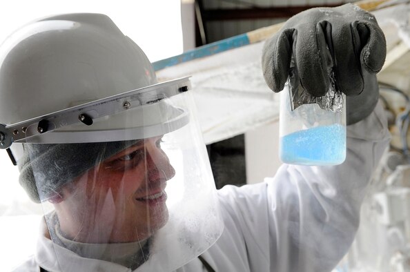 U.S. Air Force Staff Sgt. Dustin Volpi, 354th Logistics Readiness Squadron fuels distribution supervisor, tests liquid oxygen for purity March 20, 2012, Eielson Air Force Base, Alaska. Quality liquid oxygen is used to provide oxygen to pilots and aircrews at altitudes above 10,000 feet. (U.S. Air Force photo/Staff Sgt. Jim Araos)