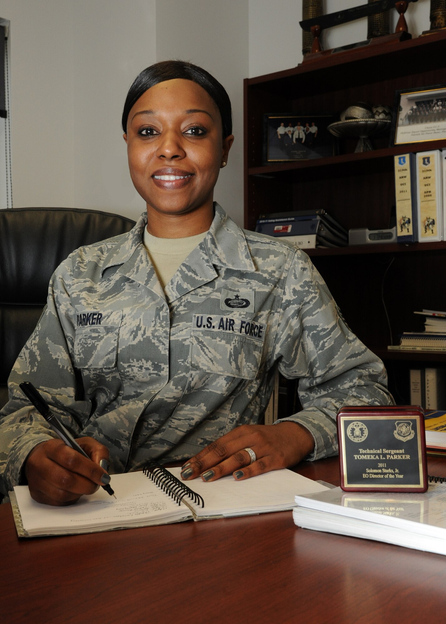 Tech. Sgt. Tomeka Parker, 319th Air Base Wing Equal Opportunity director, poses for a photo March 23, 2012, on Grand Forks Air Force Base, N.D. Parker was named EO Director of the Year for the Air Mobility Command and the U.S. Air Force. (U.S. Air Force photo/Airman 1st Class Ashley N. Taylor)