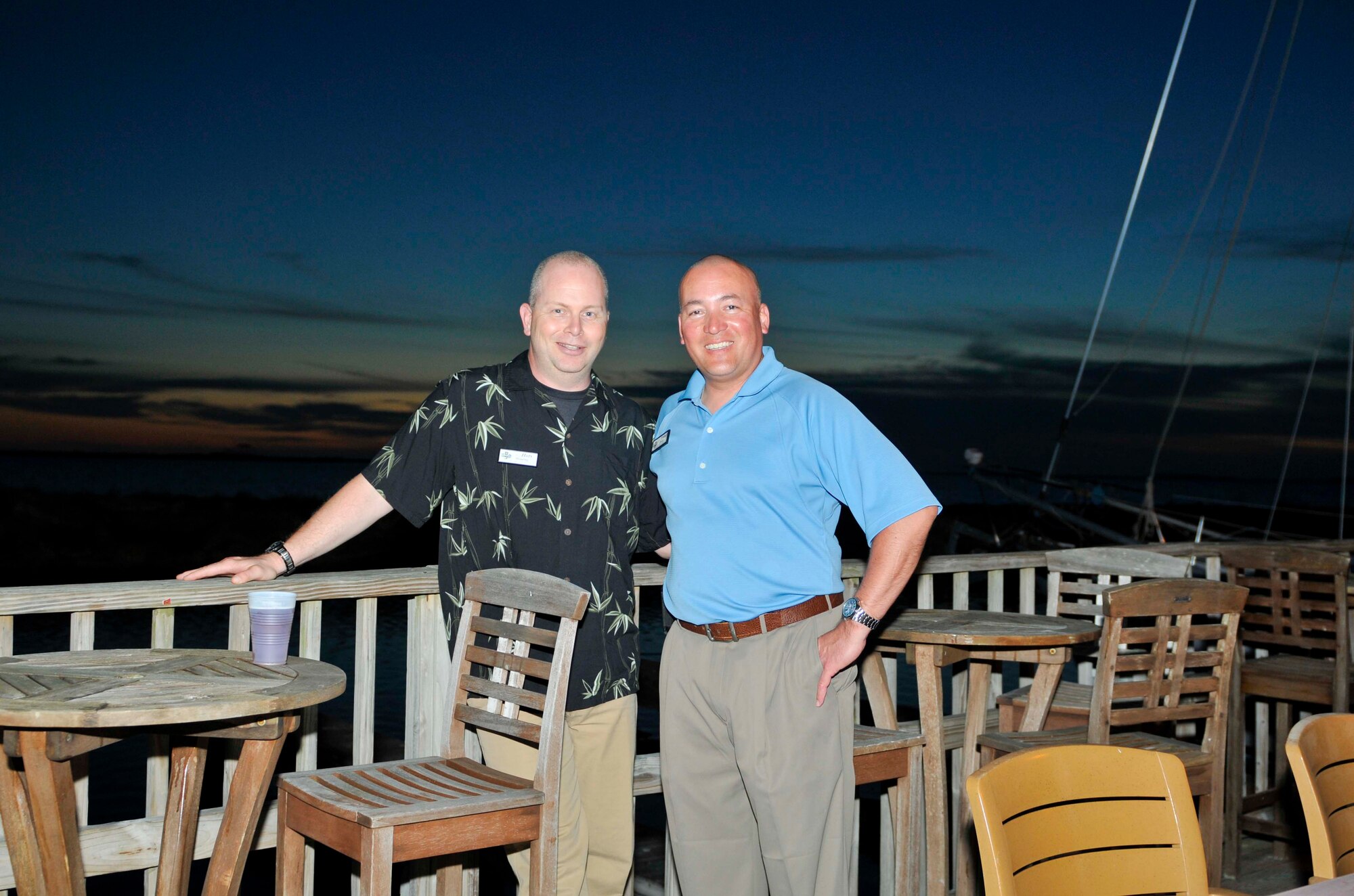 Chief Master Sgt. Jim Hotaling (left), Air Forces Northern command chief, and Chief Master Sgt. Mitchell Brush spend time together during the social outing for the AFNORTH Commander’s Conference at Tyndall Air Force Base, Fla., March 20. Chief Brush passed responsibility of the command’s enlisted force to Chief Hotaling during a transfer of authority ceremony at Tyndall March 23. (U.S. Air Force photo by Susan Trahan) 
