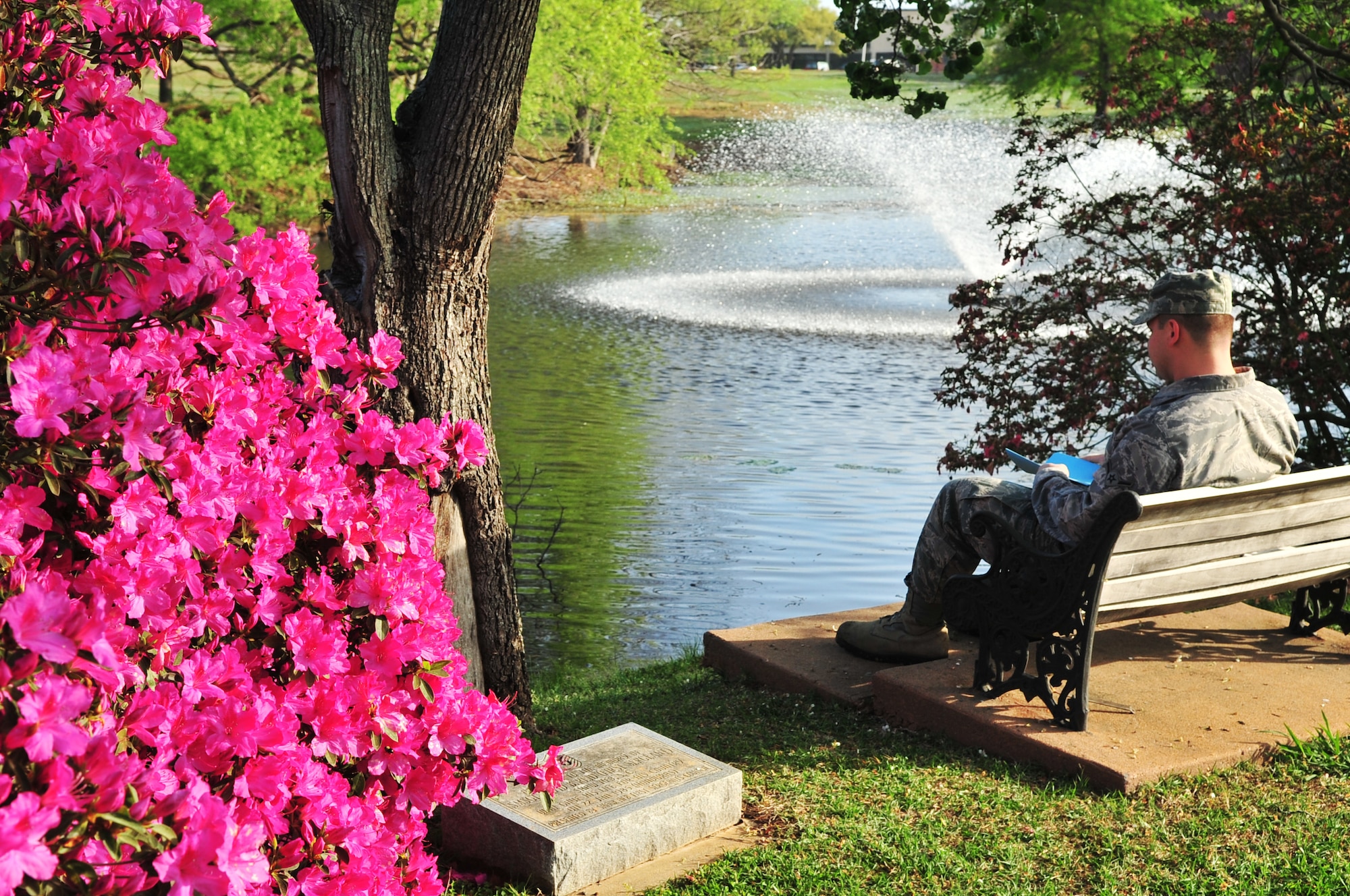 An Airman sits during a lunch break and admires the spring weather Shaw Air Force Base, S.C., March 23, 2012. (U.S. Air Force photo by Airman 1st Class Ashley L. Gardner/Released)