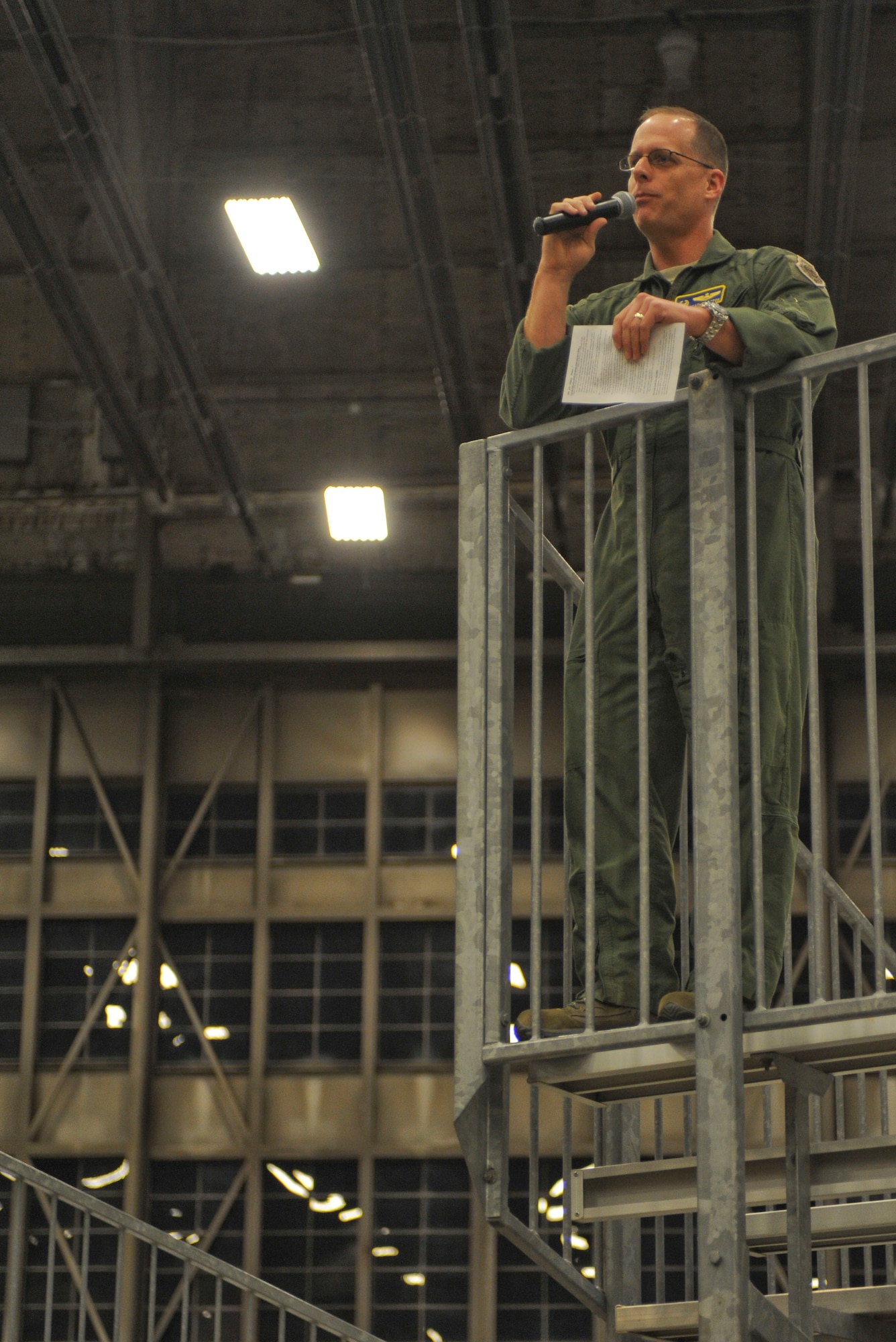 Col. Mark Weatherington, 28th Bomb Wing commander, announces the end of an Operational Readiness Exercise in the Pride Hangar at Ellsworth Air Force Base, S.D., March 16, 2012.  He praised the proficiency Airmen demonstrated during the ORE thanked them for their dedication, and announced the cancellation of the Operational Readiness Inspection that was slated for April.  (U.S. Air Force photo by Airman 1st Class Anania Tekurio/Released)  