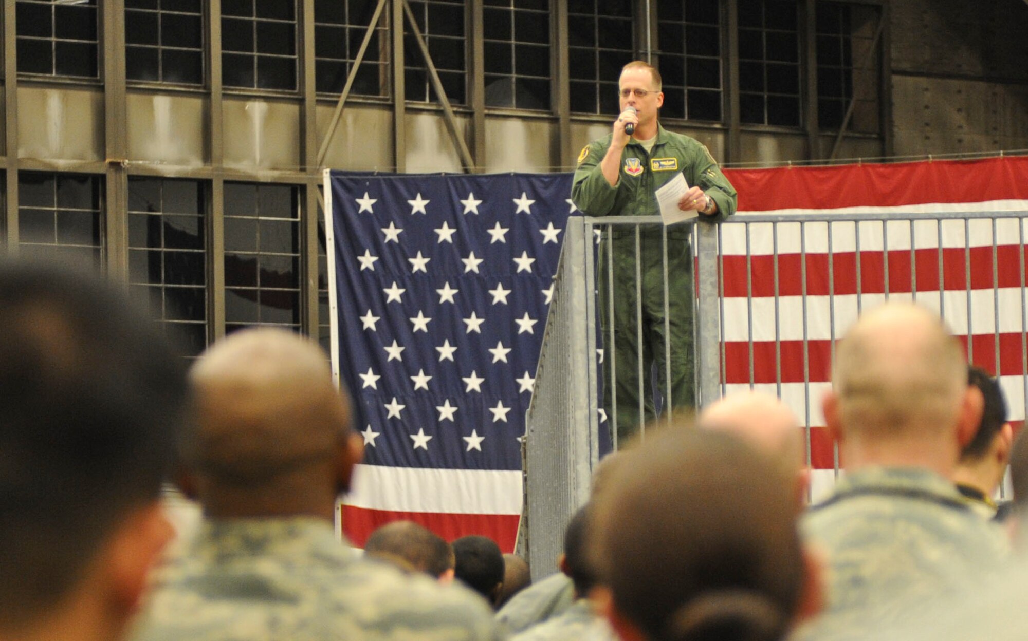 Col. Mark Weatherington, 28th Bomb Wing commander, speaks to Airmen in the Pride Hangar at the close of a recent Operational Readiness Exercise of Ellsworth Air Force Base, S.D., March 16, 2012.  Weatherington announced the end of the ORE, as well as the cancellation of an Operational Readiness Inspection scheduled for April 2012.  (U.S. Air Force photo by Airman 1st Class Anania Tekurio/Released)