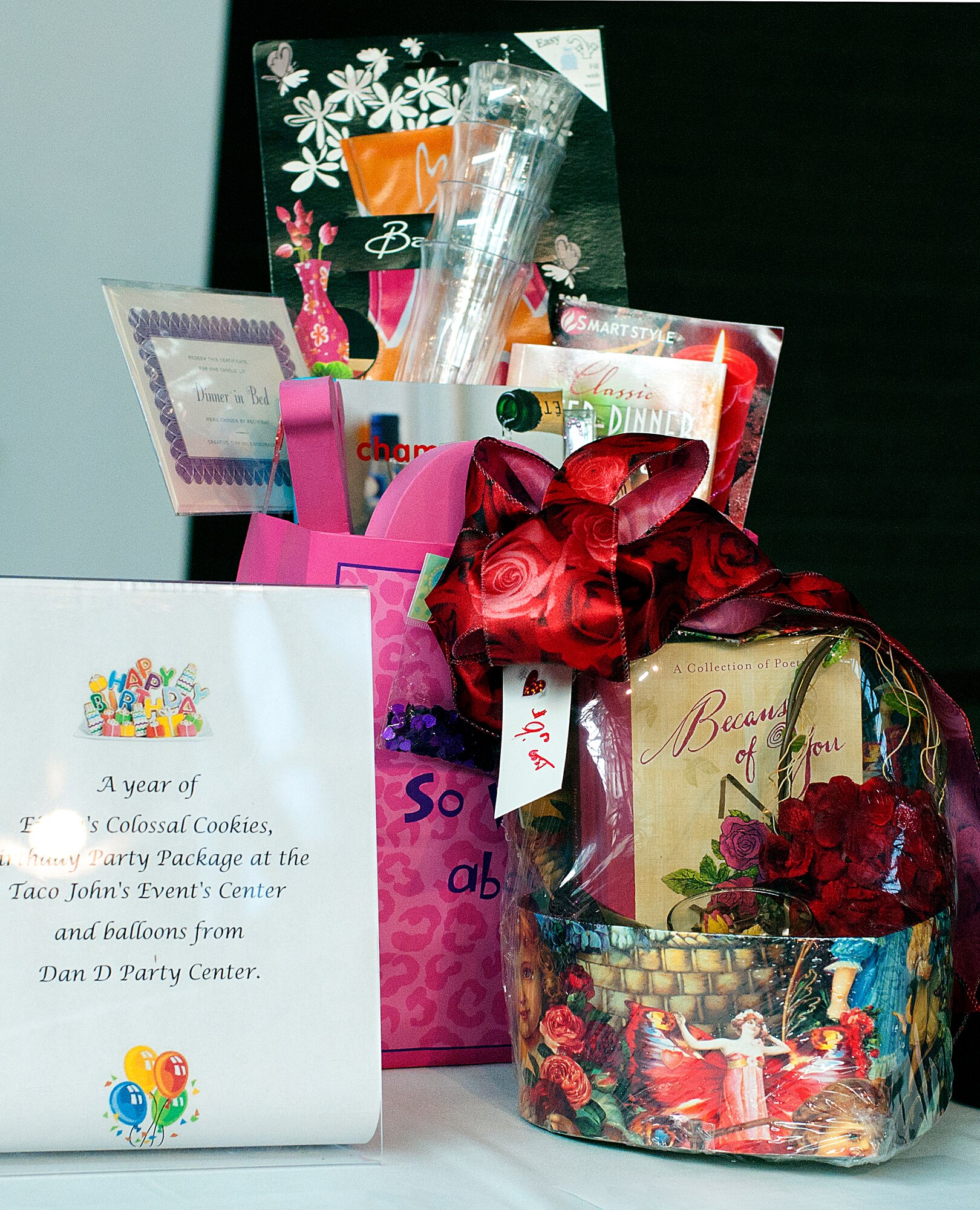 Items donated by local businesses are displayed for the silent bidding portion of the Warren Spouses' Club Basket Auction in the Fall Hall Community Center March 17. The event was divided into three sections:  silent auction, dessert auction and live action. (U.S. Air Force photo by R.J. Oriez)
