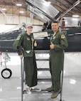 Lt. Col. Darryl Parkinson (right), 560th Flying Training Squadron Pilot for a Day project officer, signals "thumbs up" with Sarah Neal, Pilot for a Day selectee, as they explore a T-38 March 9 at Joint Base San Antonio-Randolph. (US Air Force photo by Melissa Peterson)