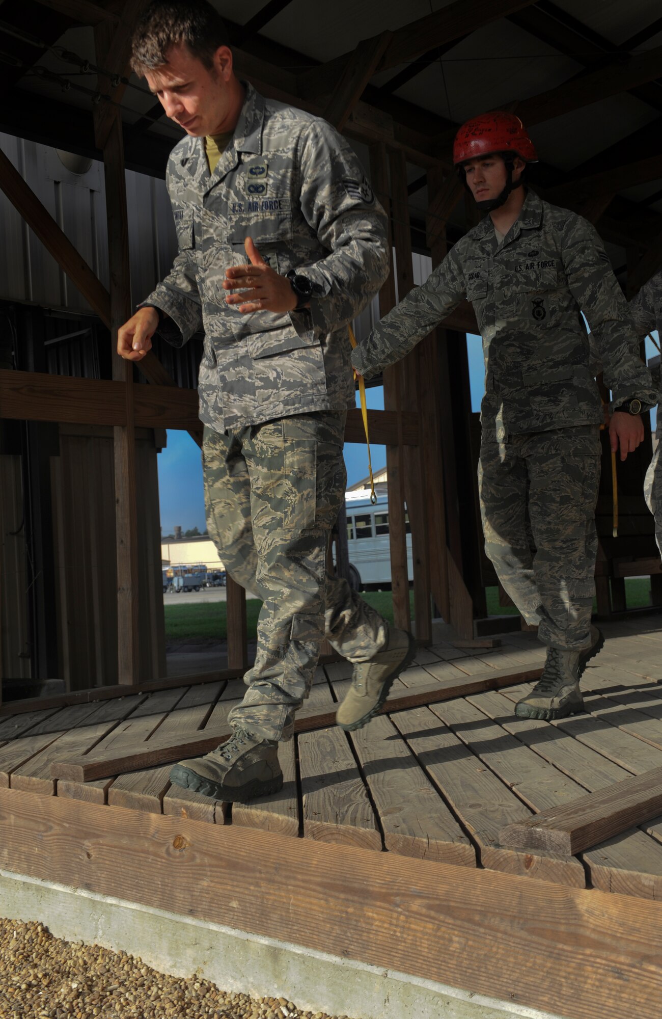 U.S. Air Force Staff Sgt. Tyler Smitka, 823d Base Defense Squadron fire team leader, demonstrates the proper procedures to jump out of an HC-130P Combat King at Moody Air Force Base, Ga., March 21, 2012. Every Airman is given pre-jump training before a jump to ensure their safety and refreshes them on the proper procedures.(U.S. Air Force photo by Airman 1st Class Douglas Ellis/Released)
