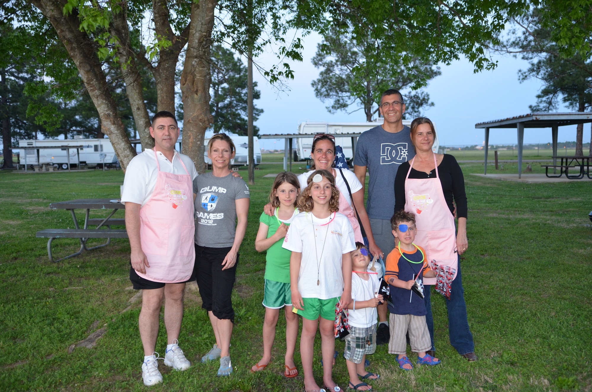 Winners of the Cook It Up Challenge are, from left, Andrew Marulis and Jodi Jordan, Jennifer Kowalski and her children, David and Kelly Sanchez. The cooking challenge was held March 13 at the Famcamp as part of the 42nd Force Support Squadron's Ultimate Family Outing. (Air Force photo/Stacy Brock)