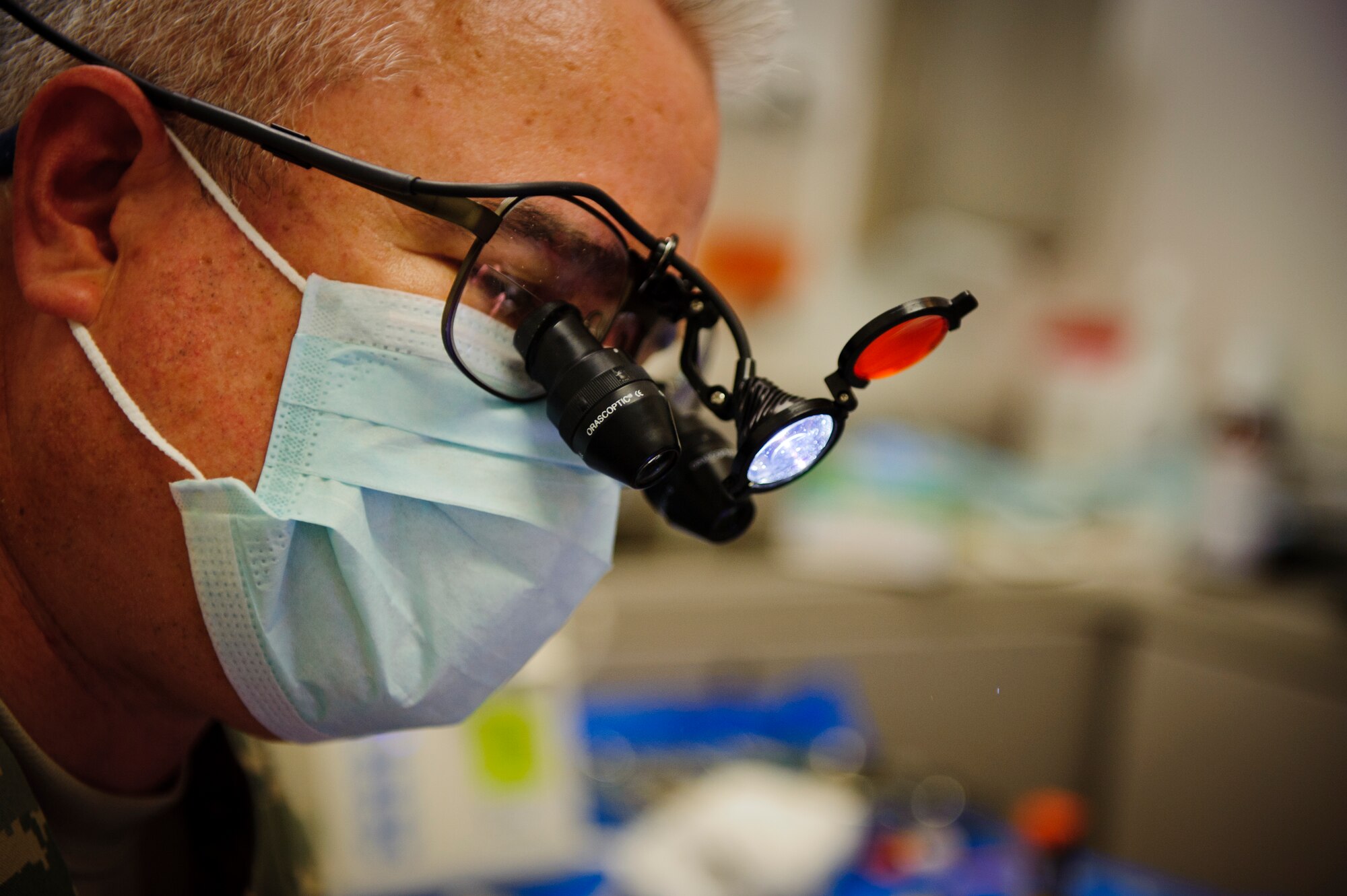 SOUTHWEST ASIA – U.S. Air Force Lt. Col. Richard Eckert, 379th Expeditionary Medical Group dentist, works on Roy’s tooth here March 15, 2012. (U.S. Air Force photo/Staff Sgt. Nathanael Callon)