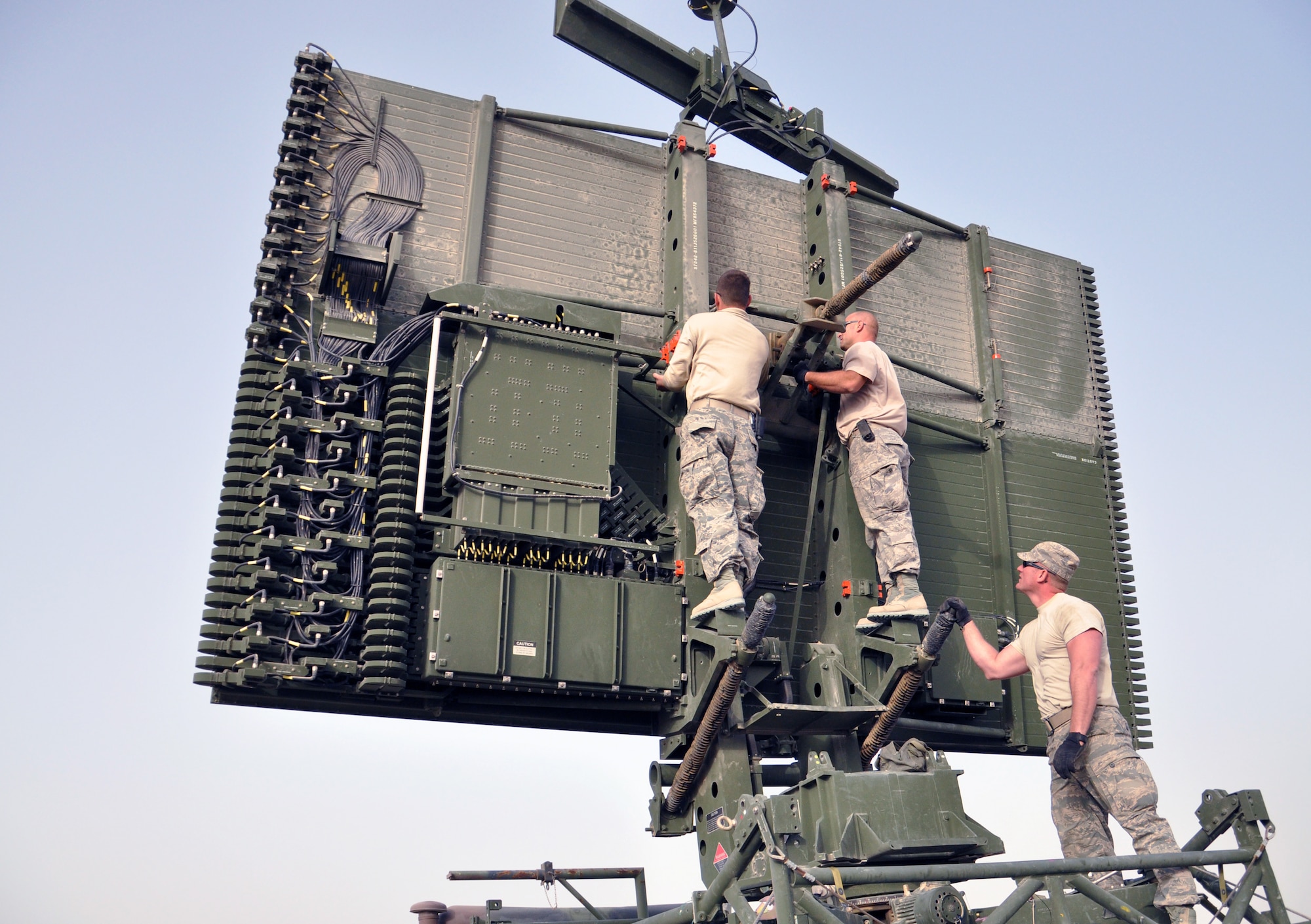 SOUTHWEST ASIA  - Members of the 727th Expeditionary Air Control Squadron set up their newest radar at the 380th Air Expeditionary Wing March 18, 2012. The TPS-75 radar will help them monitor aerial activity in support of the defense of the Arabian Gulf. (U.S. Air Force photo/1st Lt. Victoria Porto)