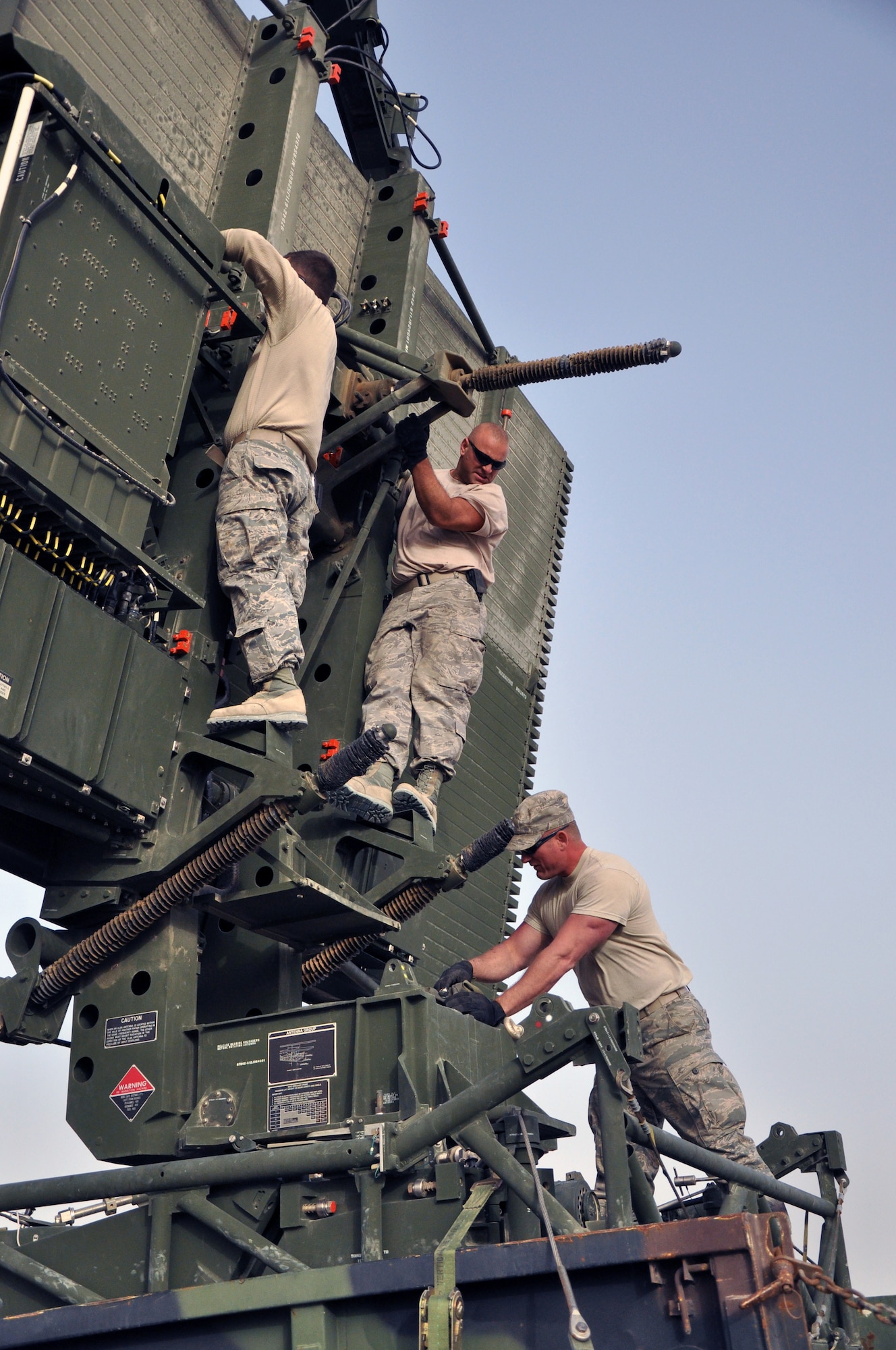 SOUTHWEST ASIA  - Members of the 727th Expeditionary Air Control Squadron set up their newest radar at the 380th Air Expeditionary Wing March 18, 2012. The TPS-75 radar will help them monitor aerial activity in support of the defense of the Arabian Gulf. (U.S. Air Force photo/1st Lt. Victoria Porto)