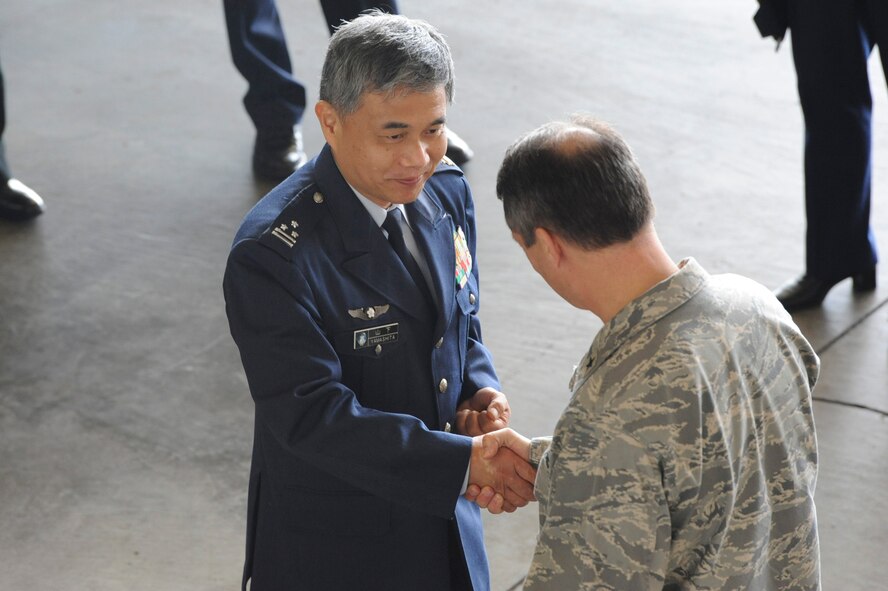 U.S. Air Force Brig. Gen. Donald Bacon, 55th Wing commander shakes hands with Col. Takayasu Yamashita, from a Japanese Defense Intelligence Headquarters during the Japanese military personnel visit to Kadena Air Base, Japan, Mar. 22, 2012. These types of exchanges are in an effort to maintain and continually improve the outstanding relationship between the U.S. and Japan. The 55th Wing is located at Offutt Air Force Base, Neb. (U.S. Air Force photo by Airman 1st Class Justin Veazie/released)