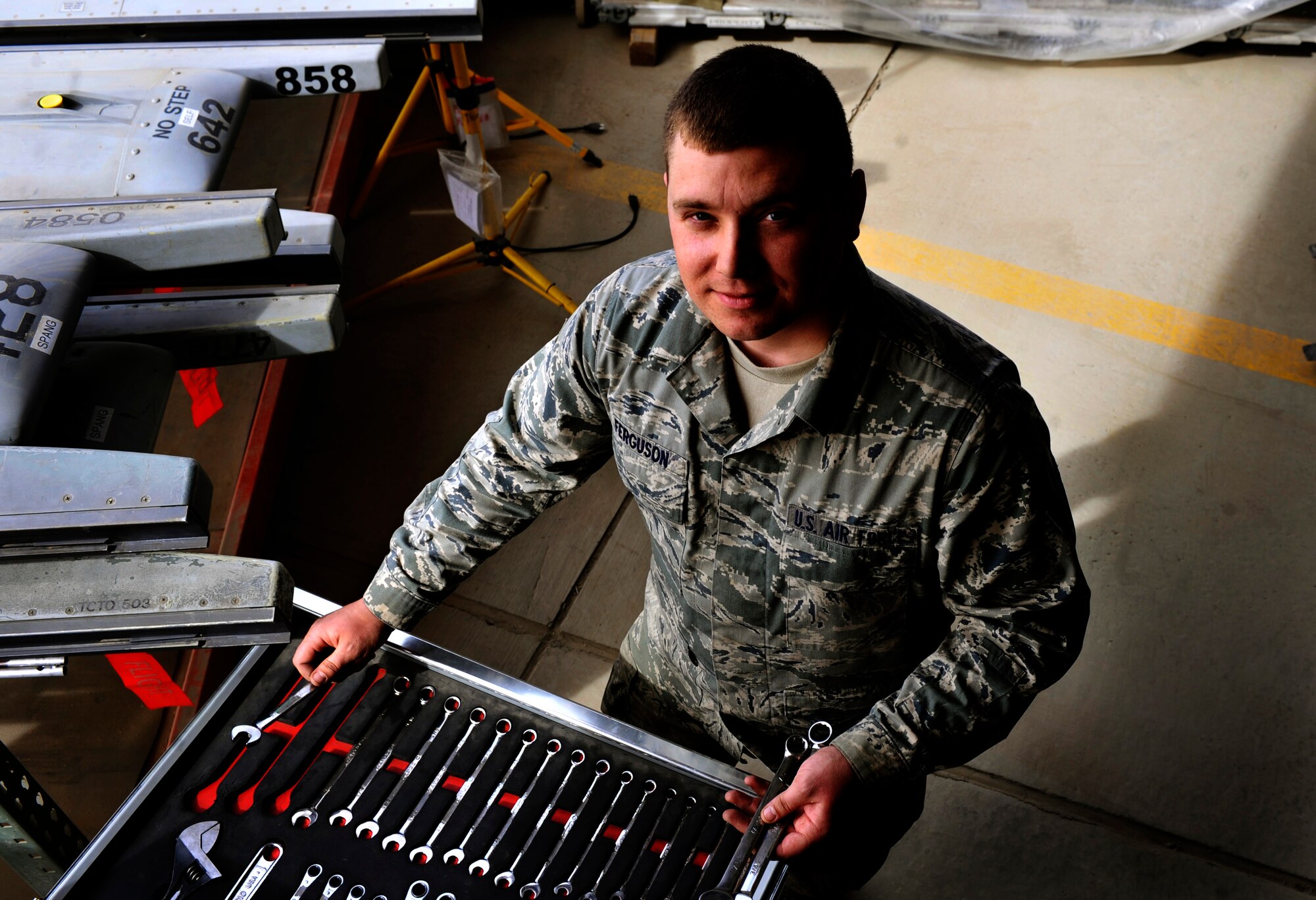 BAGRAM AIRFIELD, Afghanistan—Senior Airman Jeffrey Ferguson pauses while counting tools at Bagram Airfield, Afghanistan, March 22, 2012. Ferguson is an A-10 combat armament systems team member with the 455th Expeditionary Maintenance Squadron and is deployed from Whiteman Air Force Base, Mo. (U.S. Air Force photo/Airman 1st Class Ericka Engblom)