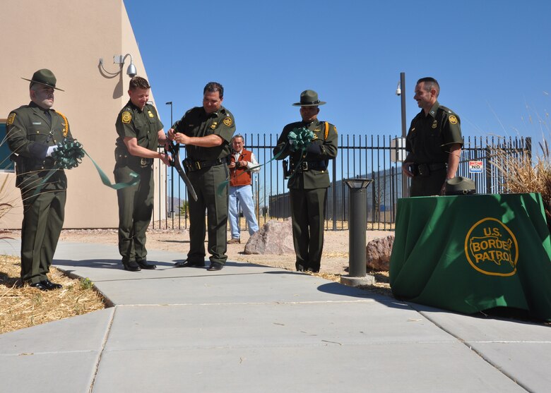 WELLTON, Ariz. – Justin Bristow, Acting Deputy Chief Patrol Agent for Yuma Sector (left), and Wayne Preston, Assistant Patrol Agent in Charge for Wellton Station, cut the ribbon at the new Border Patrol Station in Wellton, Ariz., Mar. 22. The U.S. Army Corps of Engineers Los Angeles District broke ground on the facility in March 2010 and team members were on hand for the ceremony.