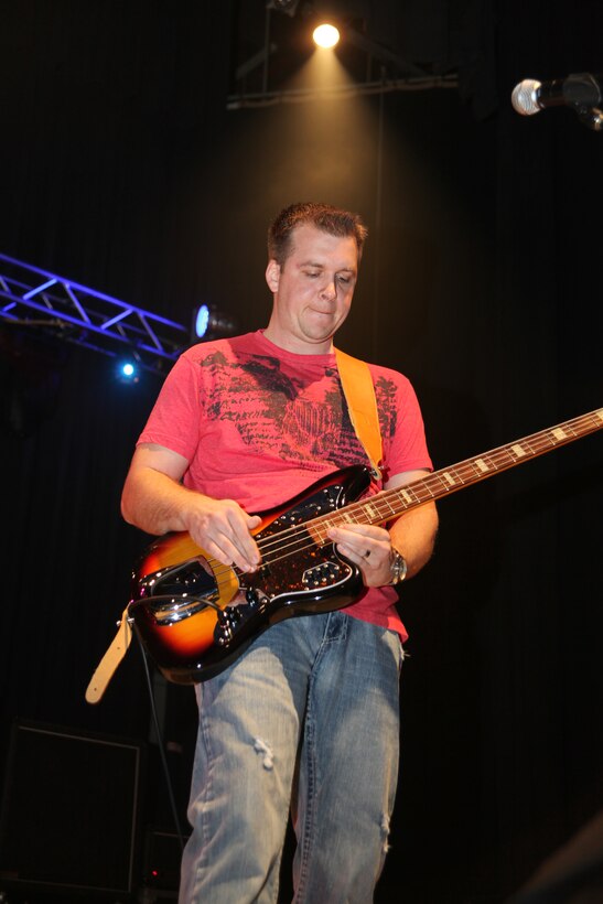 Todd Donnelly, the bassist for Fifty Watt Freight Train, plays for more than 350 music enthusiasts at the Marine Corps Air Station Cherry Point station theater for the Marine Corps Community Services Military Appreciation Concert March 24. "These guys are great and I had so much fun listening to them play," said Lance Cpl. Coty E. Yancey, a solder technician at the air station. "It was great getting to hear them play and it helped raise the morale of the Marines who attended."