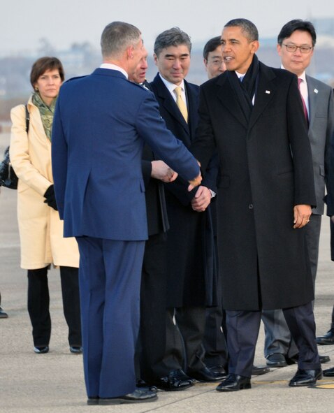 Col. Patrick McKenzie, 51st Fighter Wing commander, welcomes President Barack Obama to Osan Air Base, Republic of Korea. The president flew into the base on Air Force One March 25, 2012, on his way to the Nuclear Security Summit in Seoul. (U.S. Air Force photo/Airman 1st Class Michael Battles) 
