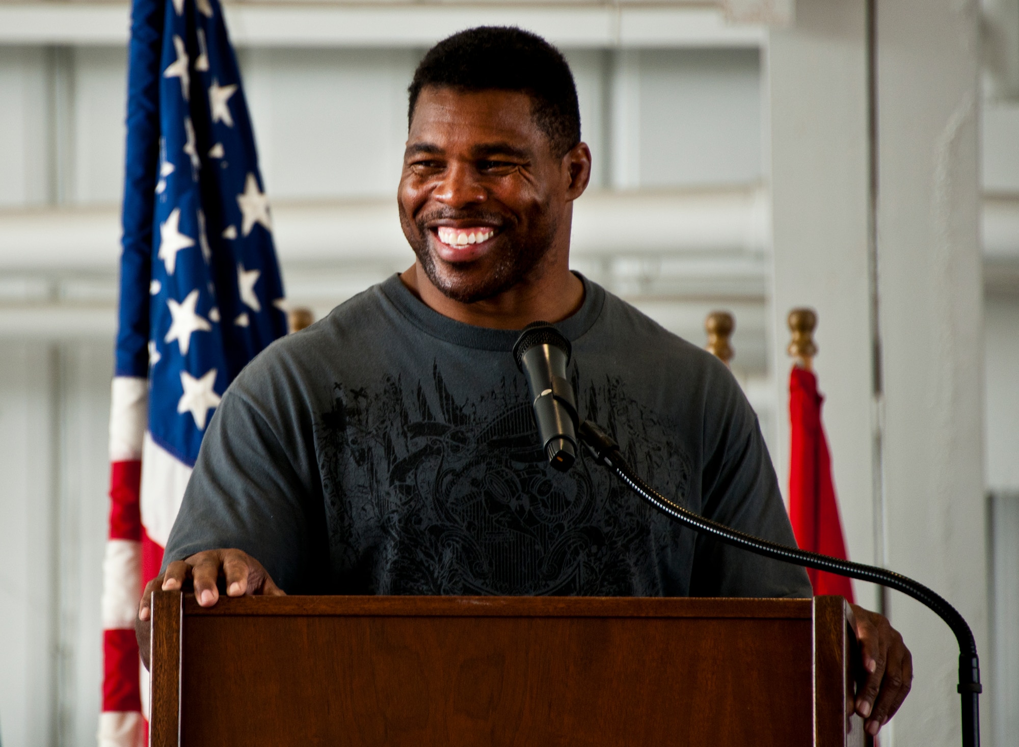 Herschel Walker spoke twice to large crowds of Team Eglin members about his life, career and the emotional and mental struggles he encountered throughout, during his visit to the base March 22.  His message was about resiliency and the importance of asking for help. (U.S. Air Force photo/Samuel King Jr.)