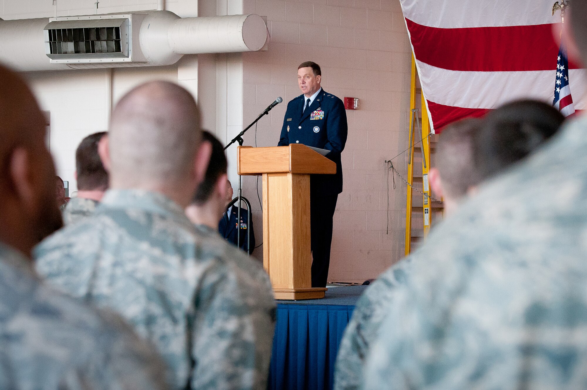 Maj. Gen. Edward Tonini, adjutant general of the Kentucky National Guard, congratulates Airmen of the 123rd Airlift Wing during an awards ceremony held March 18, 2012, at the Kentucky Air National Base in Louisville, Ky. The wing just earned its 15th Air Force Outstanding Unit Award, a nearly unprecedented achievement in the history of the U.S. Air Force. Only three other units are believed to have earned 15 AFOUAs. (U.S. Air Force photo by Senior Airman Maxwell Rechel)