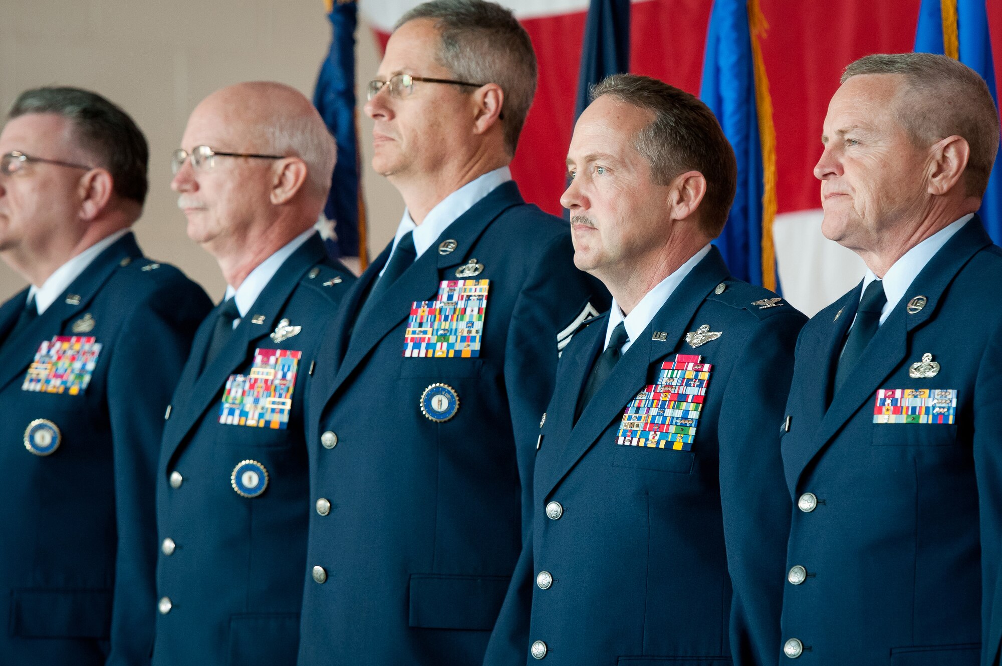 Kentucky Air National Guard leaders stand at attention during the playing of the National Anthem, beginning an awards ceremony at the Kentucky Air Guard Base in Louisville, Ky., March 18, 2012. The ceremony was held to honor three local units for excellence. (U.S. Air Force photo by Senior Airman Maxwell Rechel)