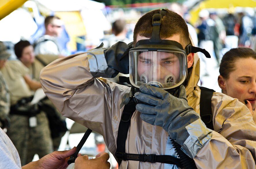 Senior Airman Josh Davison, a bioenvironmental engineering technician with the 139th Medical Group, dons a purified air-powered respirator during a Region 7 Homeland Response Force exercise at Muscatatuck Urban Training Center near Butlerville, Ind., March 21, 2012. More than 500 Missouri National Guard soldiers and airmen participated in the exercise, which evaluates their ability to react to large-scale disasters within the U.S. (Missouri Guard photo by Staff Sgt. Michael Crane)