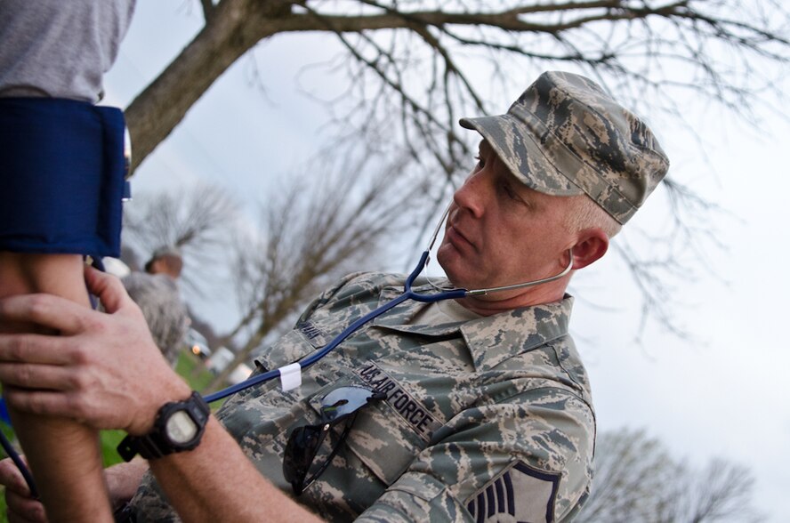 Master Sgt. Jason Vannaman, an optometry craftsman with the 139th Medical Group, checks the blood pressure of a Missouri National Guard soldier during a Region 7 Homeland Response Force exercise at Muscatatuck Urban Training Center near Butlerville, Ind., March 20, 2012. More than 500 Missouri National Guard soldiers and airmen participated in the exercise, which evaluates their ability to react to large-scale disasters within the U.S. (Missouri Guard photo by Staff Sgt. Michael Crane)