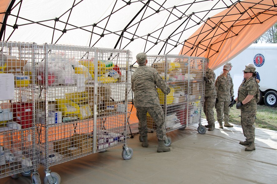 Airmen from the 139th Airlift Wing set up medical supplies during a Region 7 Homeland Response Force exercise at Muscatatuck Urban Training Center near Butlerville, Ind., March 19, 2012. More than 500 Missouri National Guard soldiers and airmen participated in the exercise, which evaluates their ability to react to large-scale disasters within the U.S. (Missouri Guard photo by Staff Sgt. Michael Crane)
