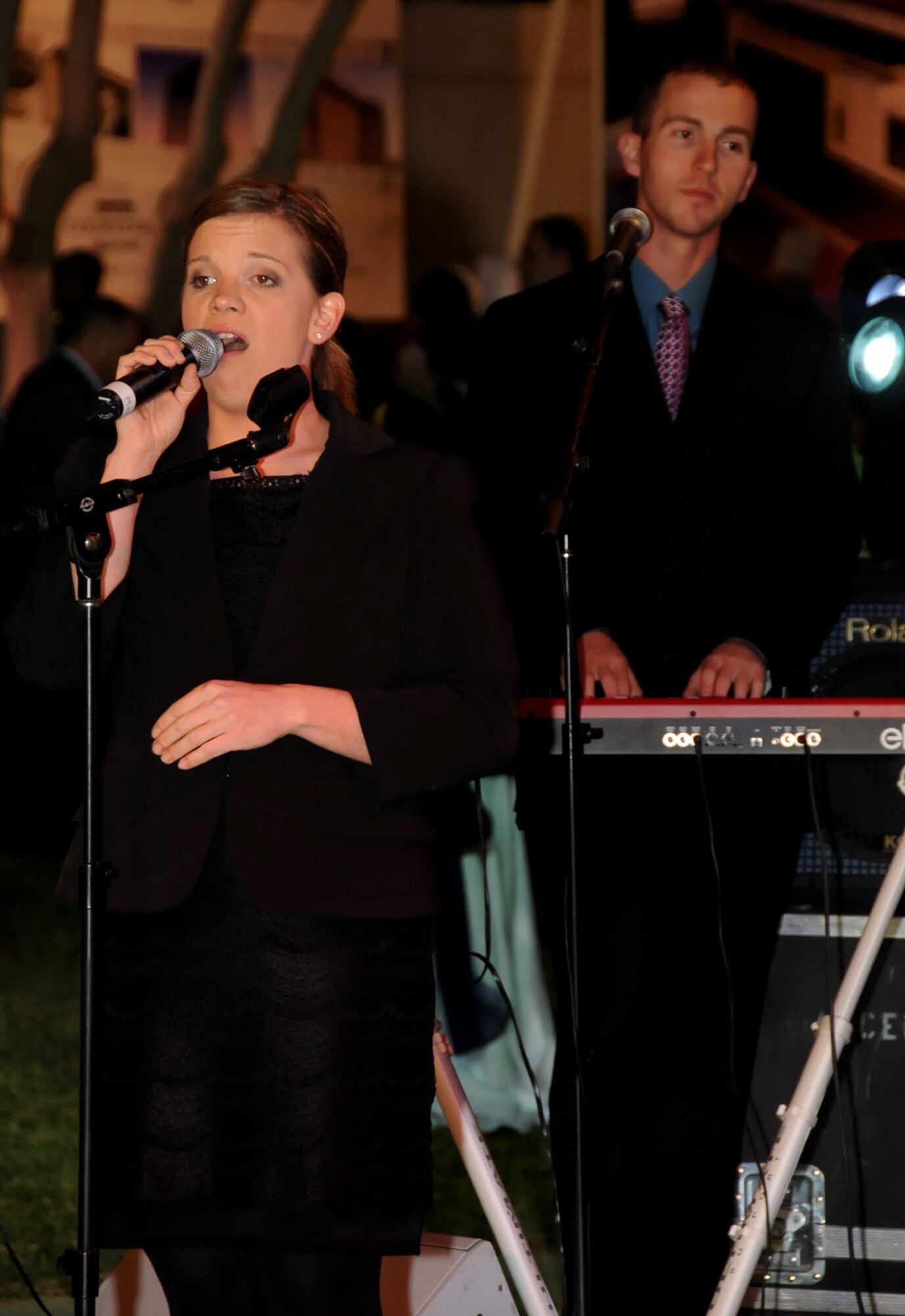 U.S. Air Force Airman 1st Class Melissa Rager, female vocalist, and Senior Airman Ryan Rager, pianist, perform as part of the U.S. Air Forces Central Band , Night Wing, in an undisclosed location, Southwest Asia, Mar. 21, 2012.  The band, deployed from Offutt Air Force Base, Neb., is a country and rock music ensemble visiting countries around the U.S. Central Command area of responsibility, bringing an eclectic mix of new and classic tunes to the delight of host nation civilians and military members. (U.S. Air Force photo/Staff Sgt. James Lieth)