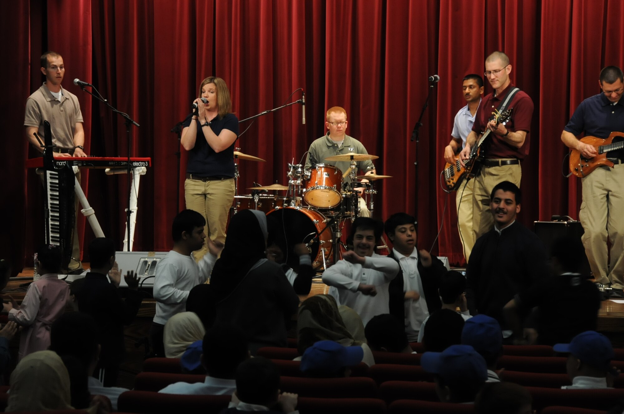 The U.S. Air Forces Central Band, Night Wing, performs for children at a host nation hospital in an undisclosed location, Southwest Asia, Mar. 21, 2012.  The band, deployed from Offutt Air Force Base, Neb., is a country and rock music ensemble visiting countries around the U.S. Central Command area of responsibility, bringing an eclectic mix of new and classic tunes to the delight of host nation civilians and military members. (U.S. Air Force photo/Staff Sgt. James Lieth)