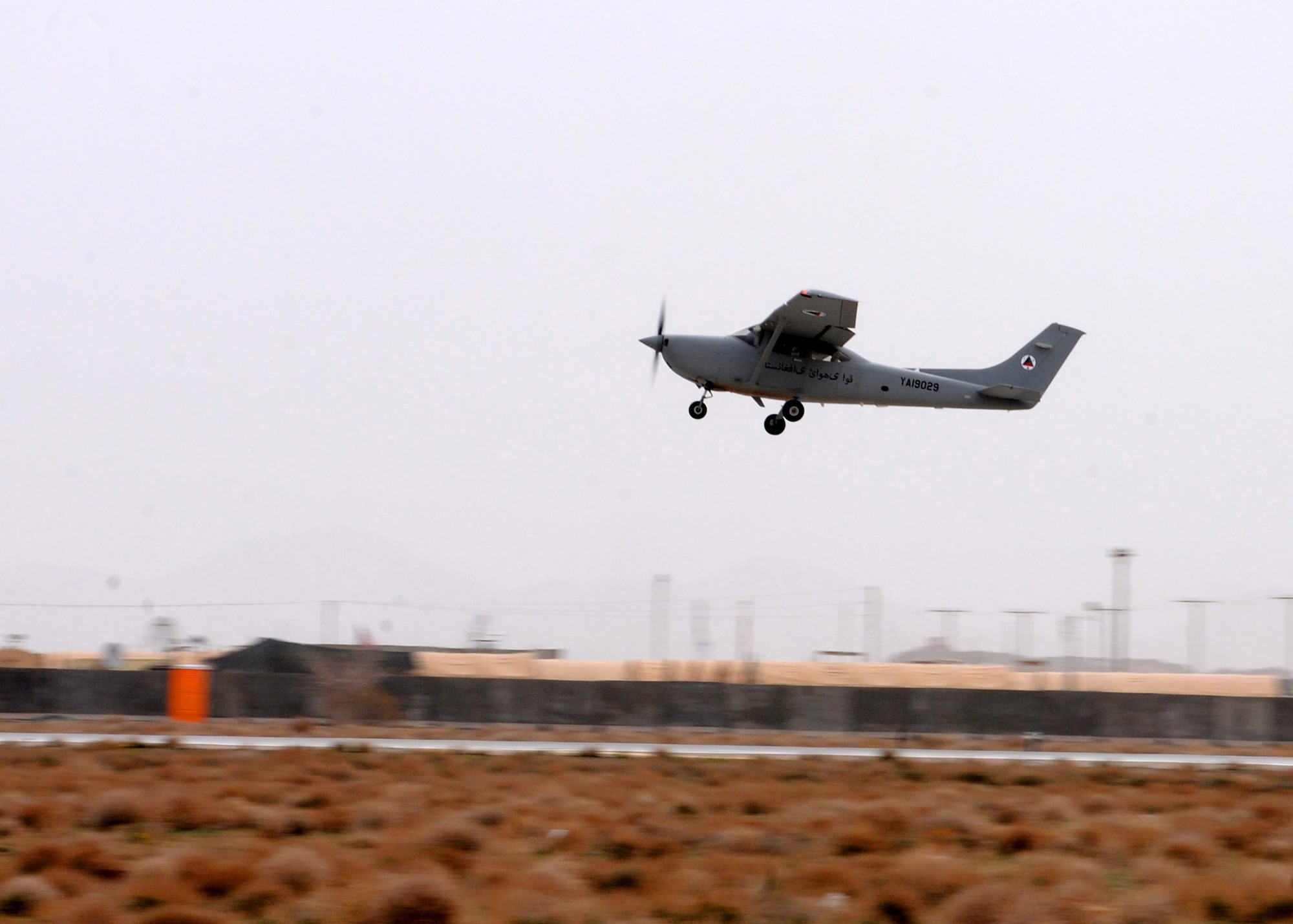 An Afghan air force Cessna 182 aircraft takes flight during Afghanistan’s first fixed-wing undergraduate pilot training at Shindand Air Base, Afghanistan, March 24, 2012. This marked the first time in more than 30 years that UPT has been performed in Afghanistan. (U.S. Air Force photo by Staff Sgt. Nadine Y. Barclay)

