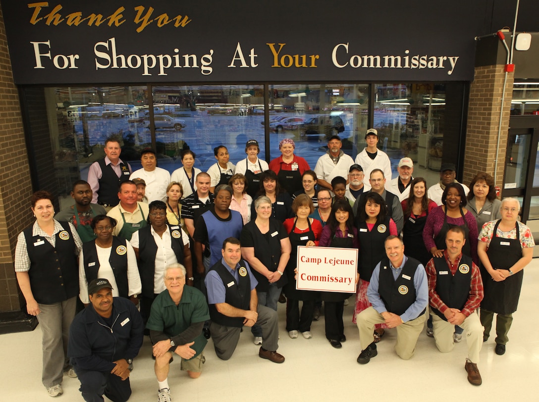 Employees of Marine Corps Base Camp Lejeune’s commissary gather for a photo to celebrate the commissary’s nomination for the “best superstore” competition, March 26. The commissary has numerous employees and contract workers that help it meet the needs of the base community and the picture shows only a small cross section of the manpower needed to maintain its operation.