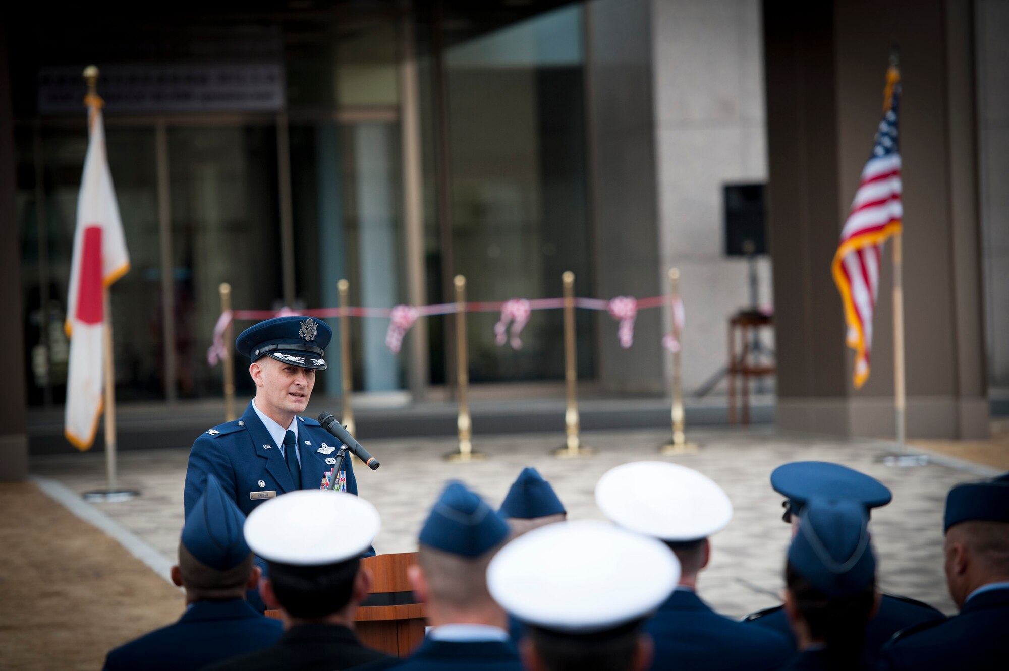 YOKOTA AIR BASE, Japan -- Col. Bill Knight, 374th Airlift Wing commander, speaks to the assembled audience at Yokota Air Base, Japan, during the opening ceremony for the new Japan Air Self-Defense Force Air Defense Command Headquarters March 26, 2012. The ADC headquarters, which conducts command and control operations to defend Japanese airspace, was relocated from Fuchu Air Base, Japan, as part of the 2002 Defense Policy Review Initiative, a bilateral process to enhance the U.S.-Japan Security Alliance and address force realignments in the Pacific. (U.S. Air Force photo/Staff Sgt. Samuel Morse)