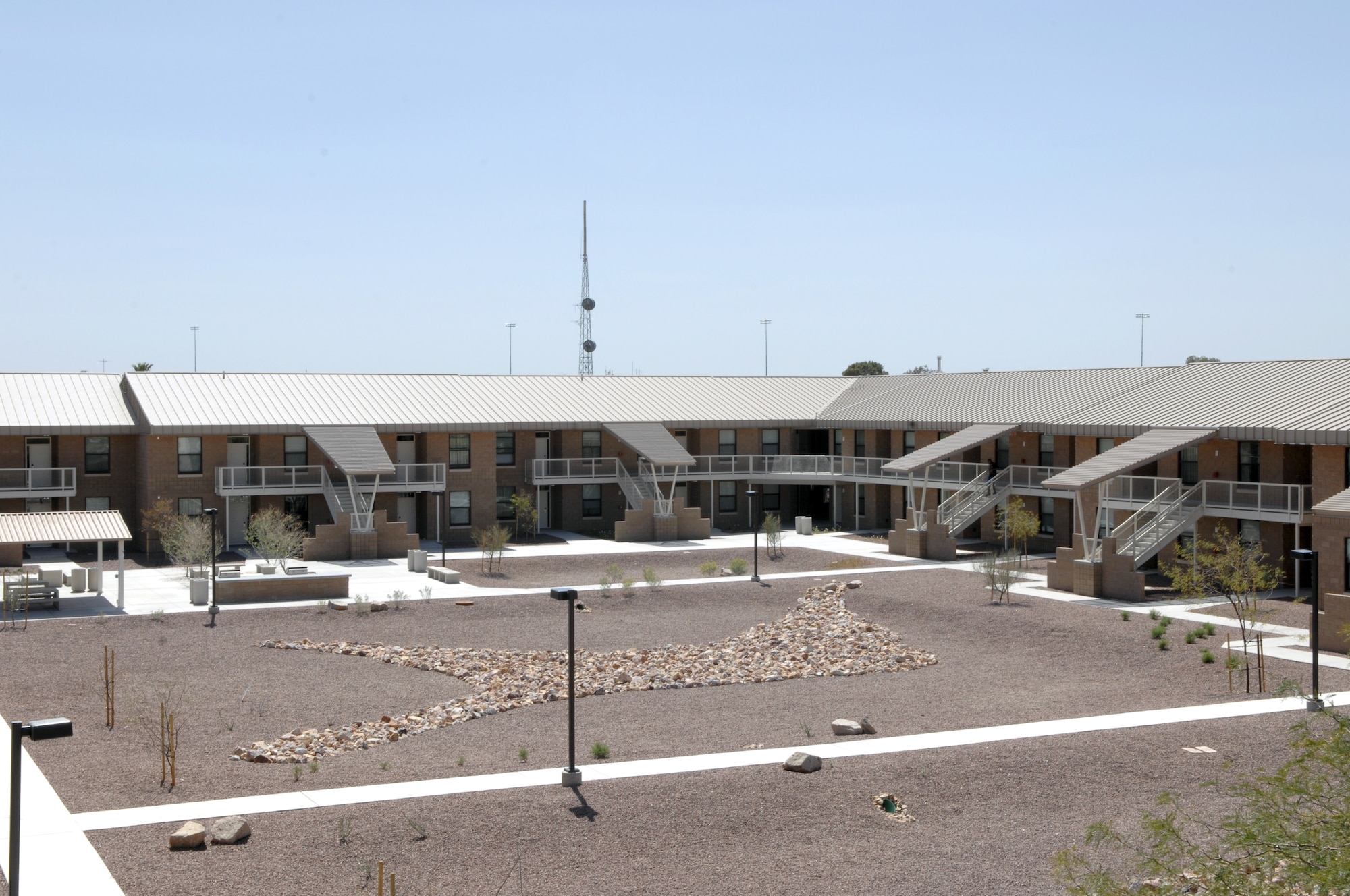 The newest dormitory on Davis-Monthan Air Force Base, Ariz., opened up to Airman Nov. 17, 2012. Each living area contains four bedrooms and a common living area. (U.S. Air Force photo by Airman 1st Class Josh Slavin/Released)