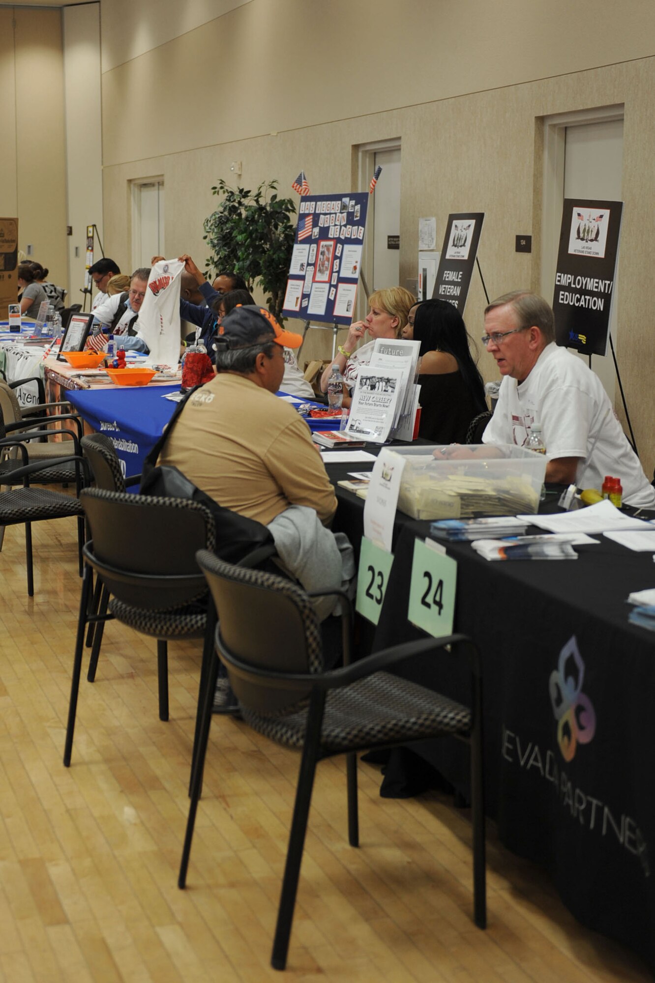 Social agencies from the Las Vegas area provide support to local veterans during the 2012 Las Vegas Veterans Stand Down, March 21, 2012.  Hundreds of veterans attended the ninth annual Veterans Stand Down at the East Las Vegas Senior Community Center. The two-day event featured more than 100 community sponsors who offered assistance on health, housing, employment and legal advice. (U.S. Air Force photo by Staff Sgt. Taylor Worley)

