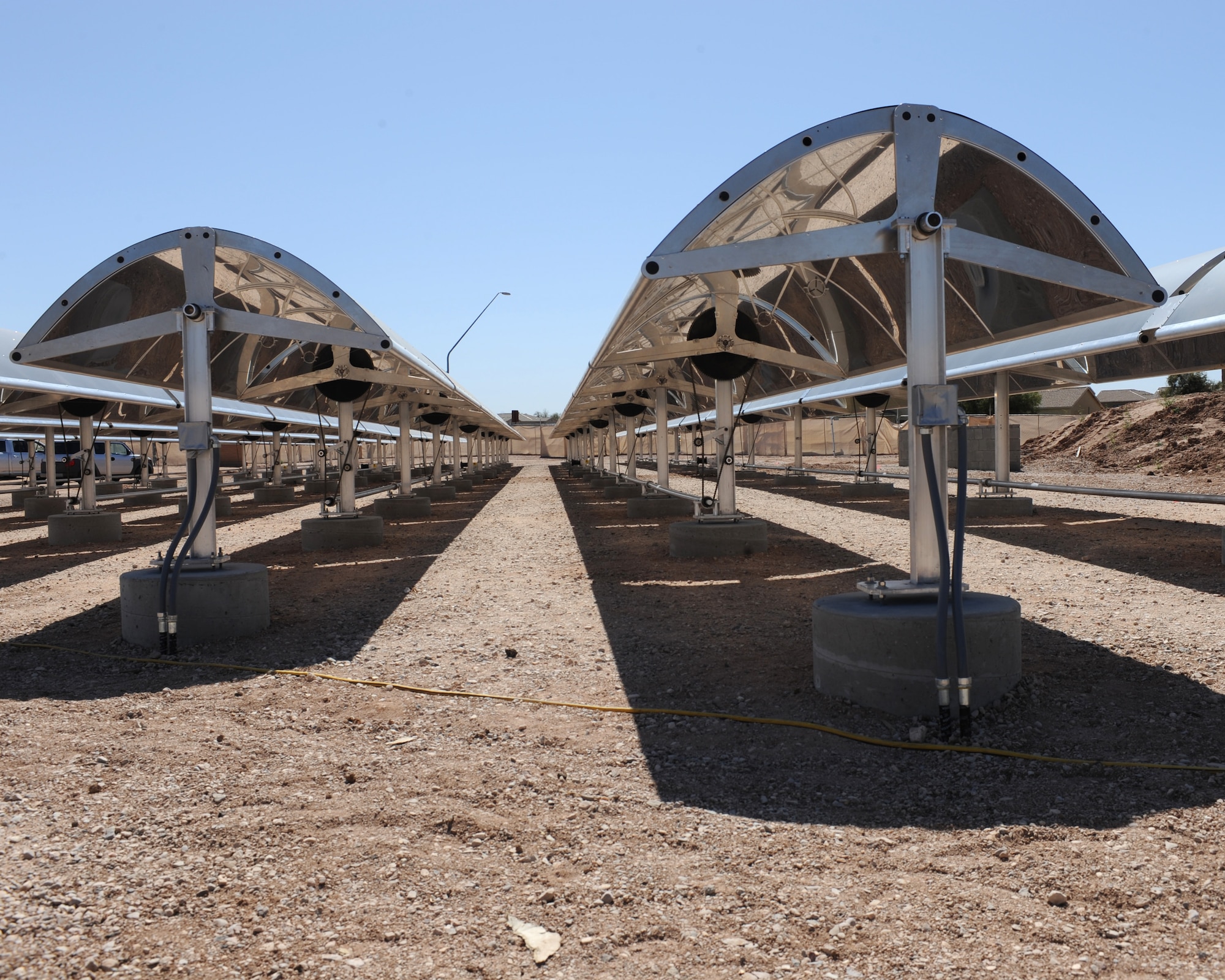 The photovoltaic panels located behind the Youth Center are used to chill water that will cool the educational and recreational center here on Davis-Monthan Air Force Base, Ariz., March 3, 2012. (U.S. Air Force photo by Airman 1st Class Timothy Moore /Released)