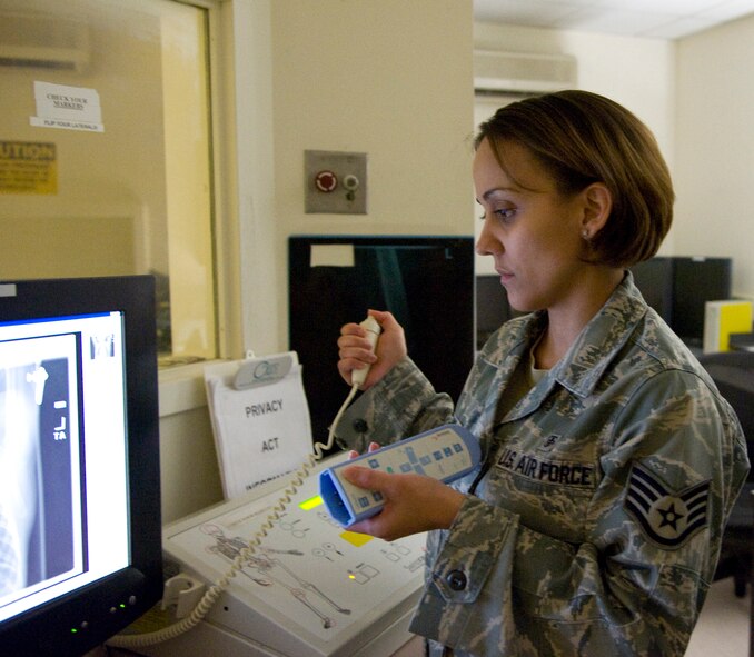 Staff Sgt. Rebecca Silvis, a diagnostic imaging technologist with the 436th Medical Support Squadron, examines an X-ray image March 22, 2012, at the Dover Air Force Base, Del., outpatient medical clinic. The radiology flight performs simple diagnostic X-rays for service members and their dependants. (U.S. Air Force photo by Senior Airman Matthew Hubby)